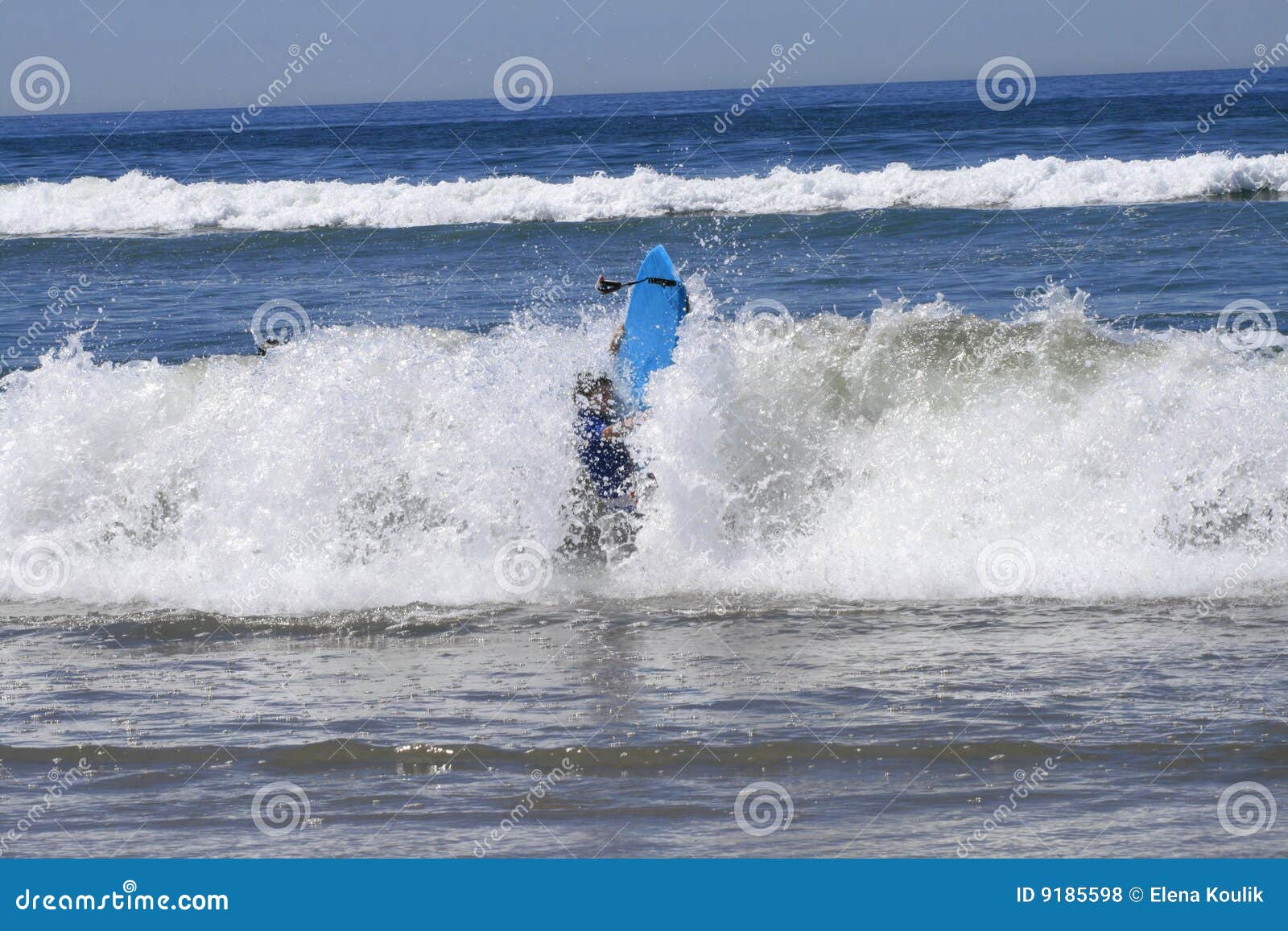 surfer wiped out by wave