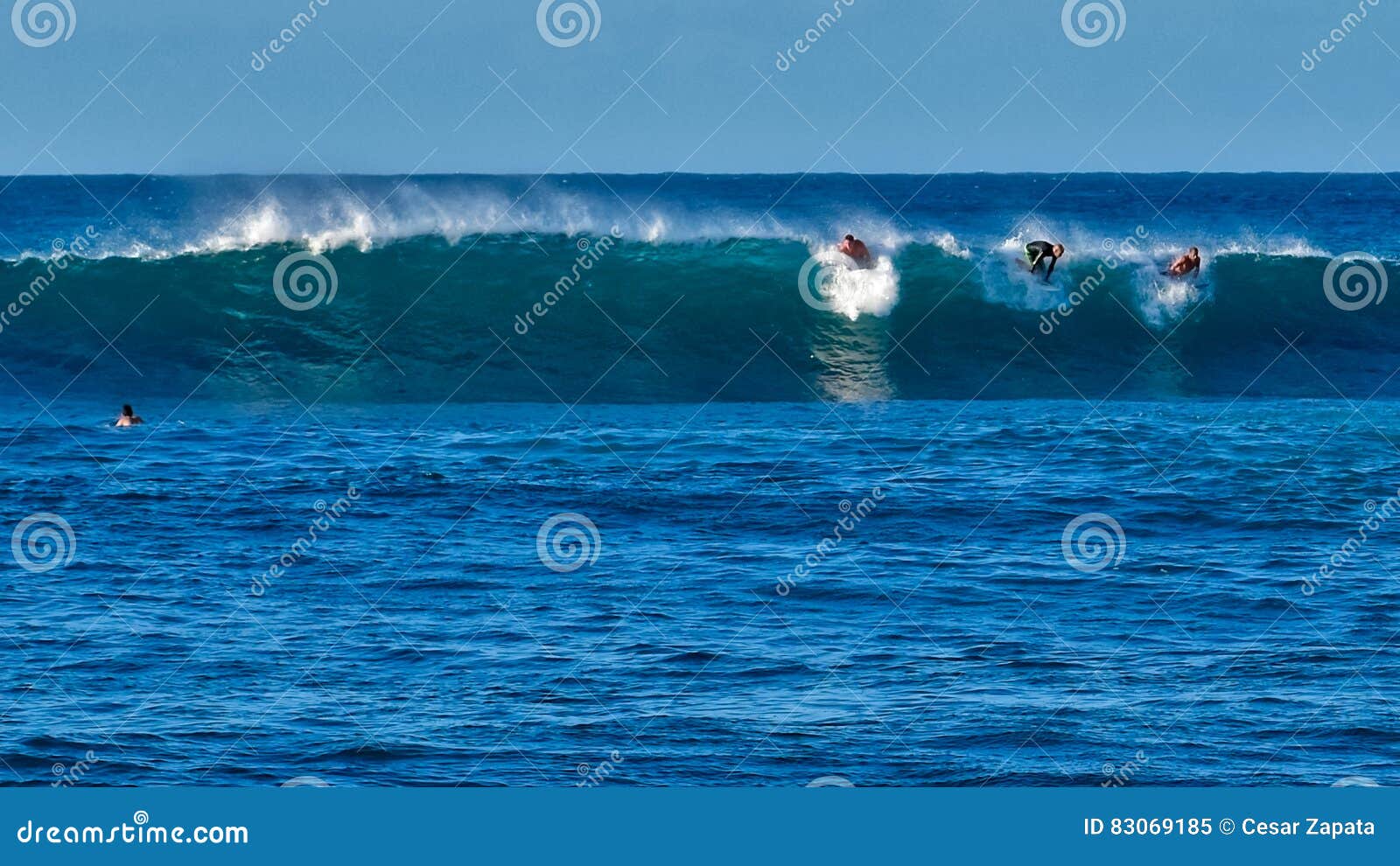 surfers at tubos beach