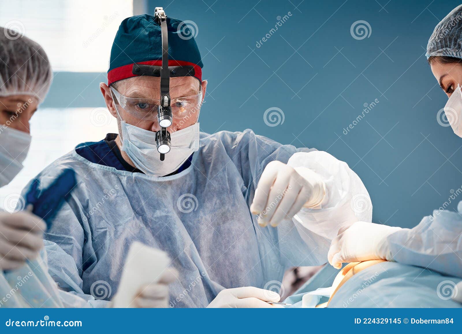 Surgeon Assistant Feeds Coagulator, Plastic Surgery, Professional