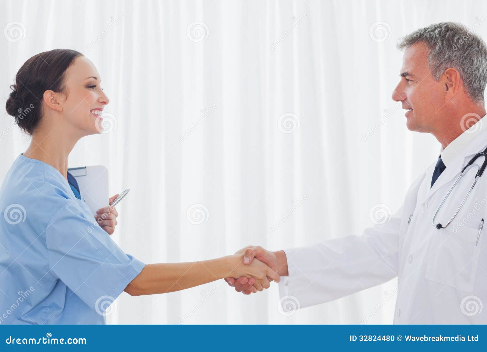 Surgeon and Doctor Shaking Hands Stock Photo Image of health