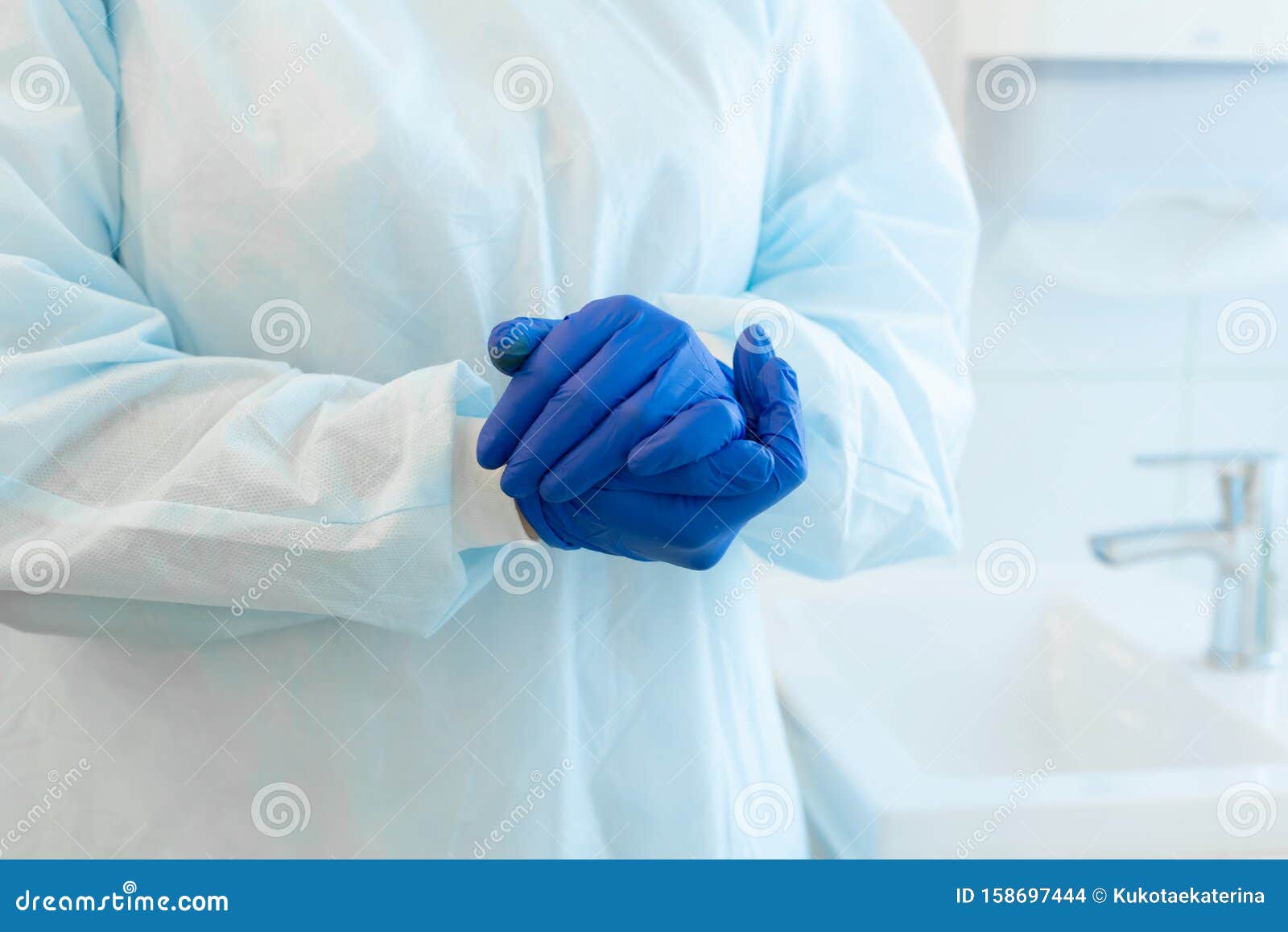 The Surgeon Prepared for the Operation. Wore Blue Sterile Gloves Stock