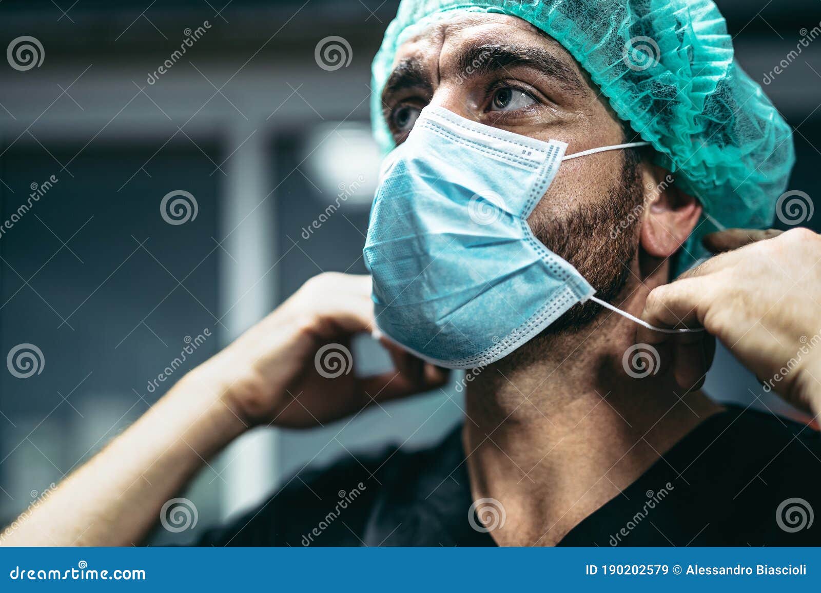 surgeon preparing for surgical operation - medical workers the real heroes during corona virus outbreak