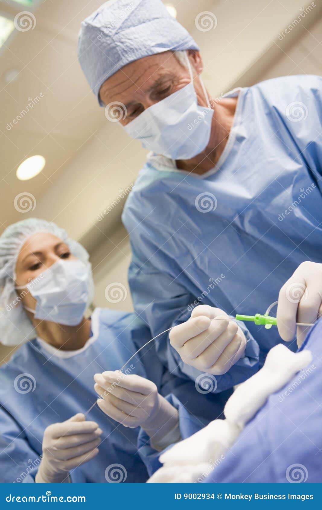 Surgeons Preparing Equipment for Surgery Stock Photo Image of colour