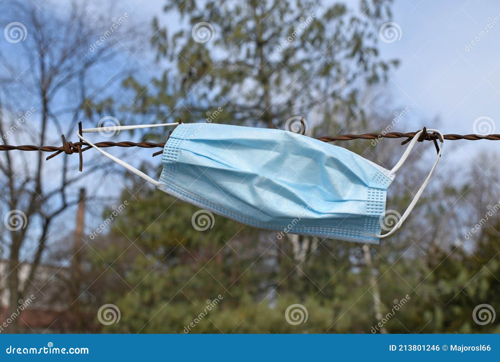 Surgical Facemask on a Barbed Wire Fence Stock Photo Image of weared