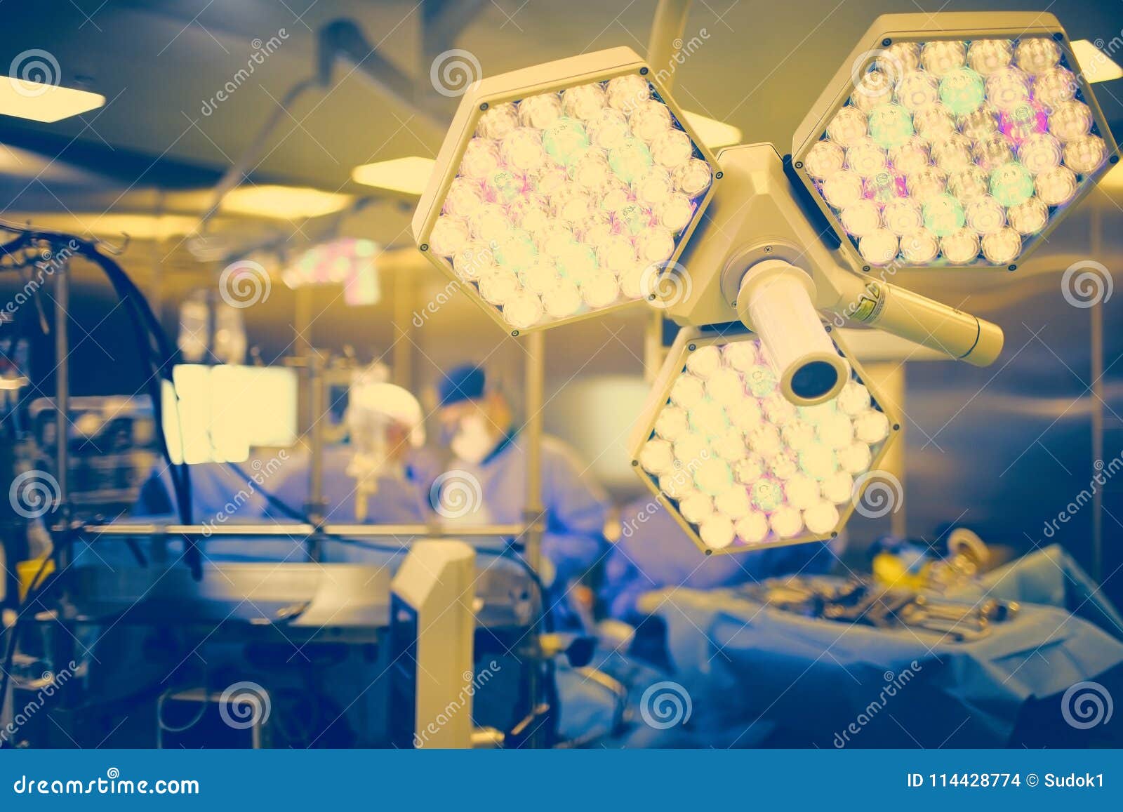 surgical shadowless lamp in the equipped room on the background