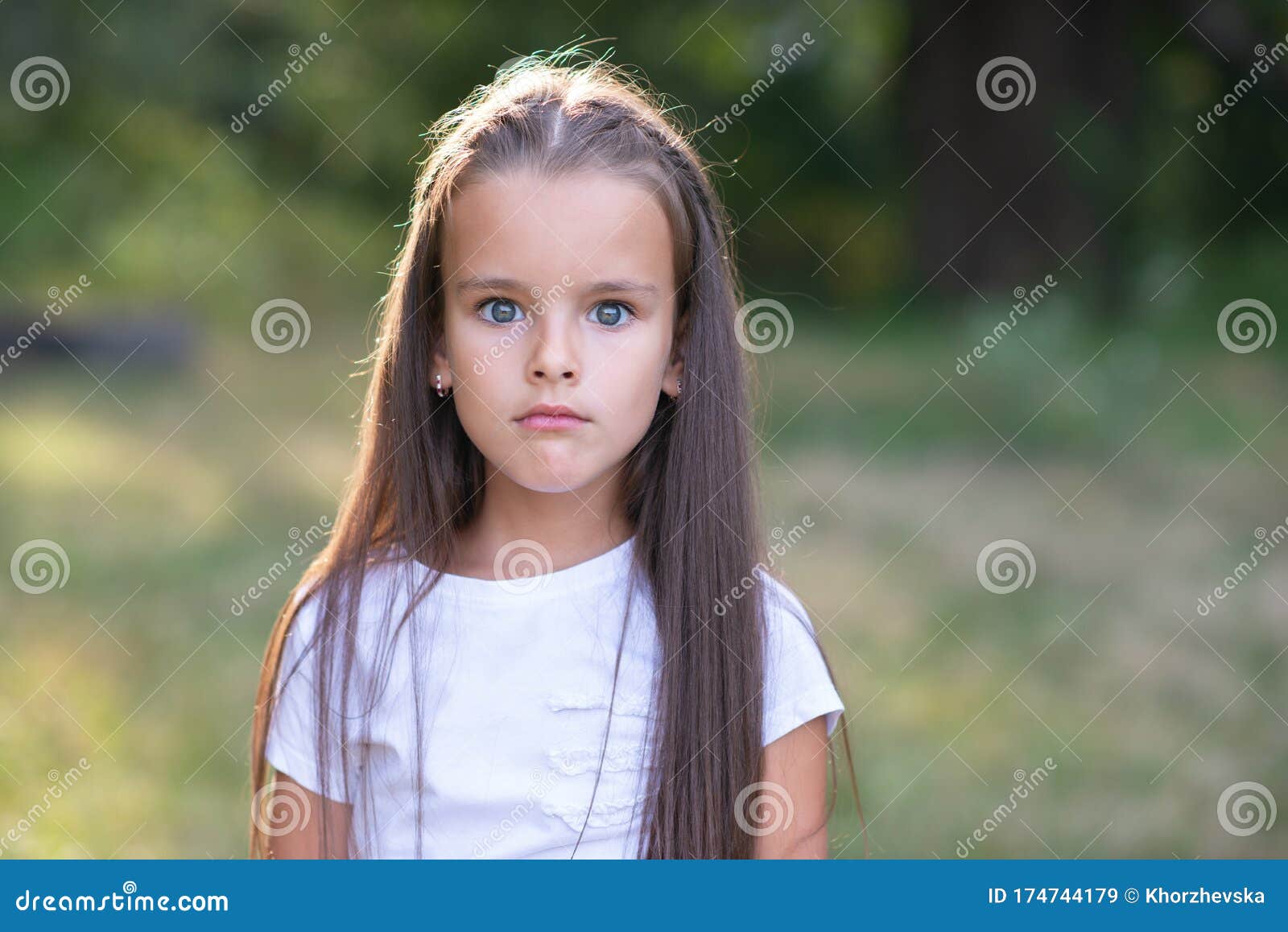 Surprise. Pretty Funny Little Girl with Long Brown Hair Posing ...