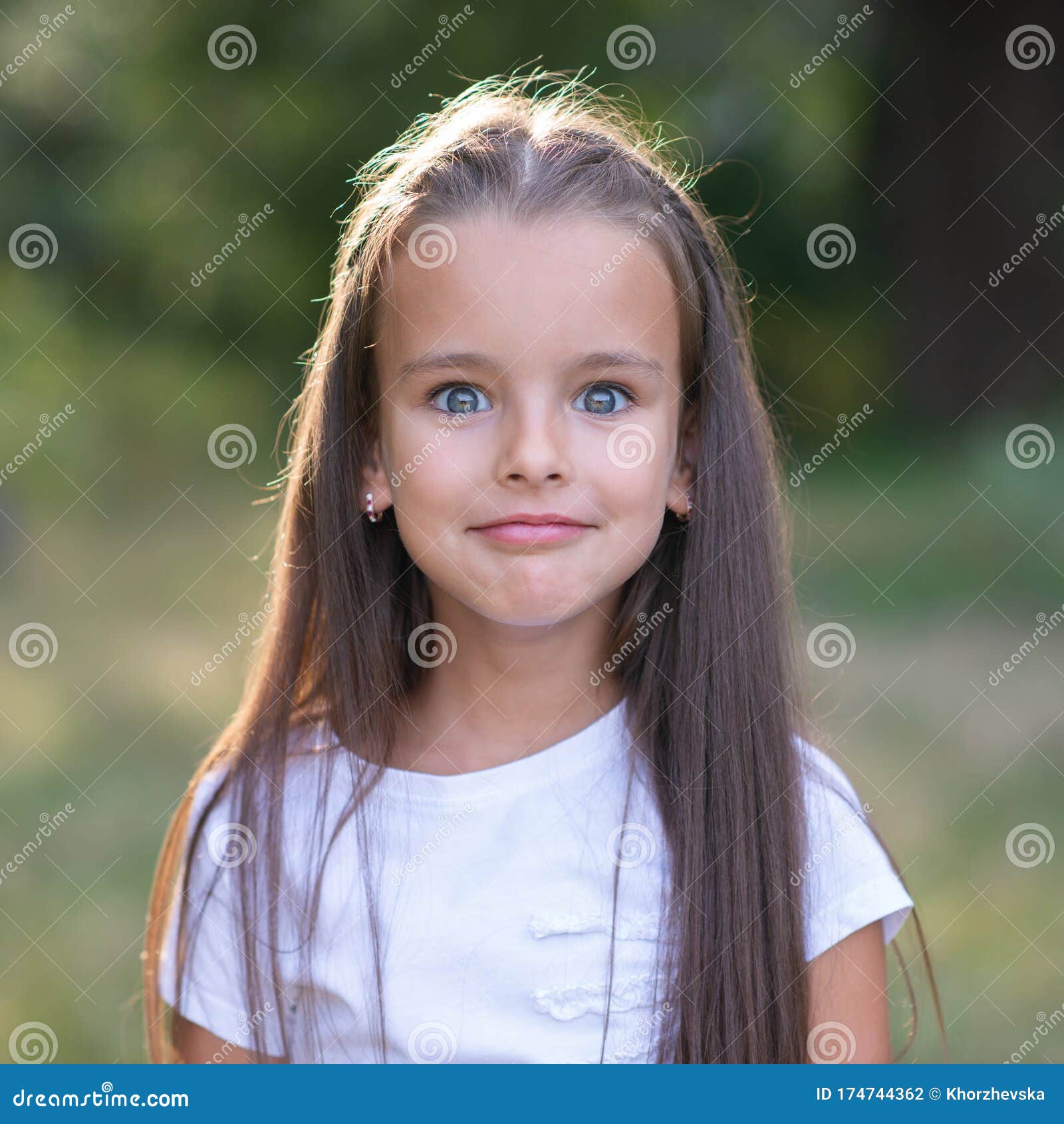Surprise. Pretty Funny Little Girl with Long Brown Hair Posing Summer Nature Outdoor. Cute Kid`s Portrait Stock Photo - Image of girl, expressions: 174744362 Surprise. Pretty Funny Little Girl with Long Brown Hair Posing Summer Nature Outdoor. Cute Kid`s Portrait Stock Photo - Image of girl, expressions: 174744362