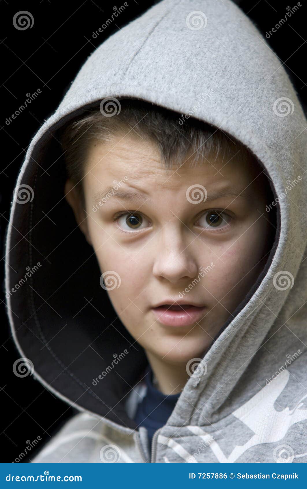 Surprised boy in hood stock photo. Image of isolated, black - 7257886