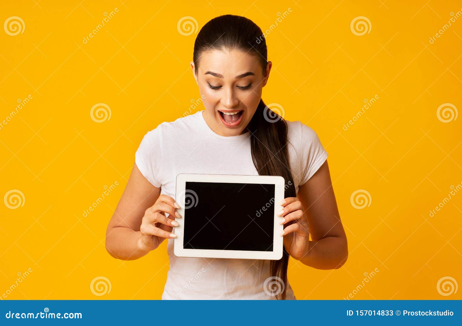 surprised woman showing empty copy space surprised woman showing empty copy space