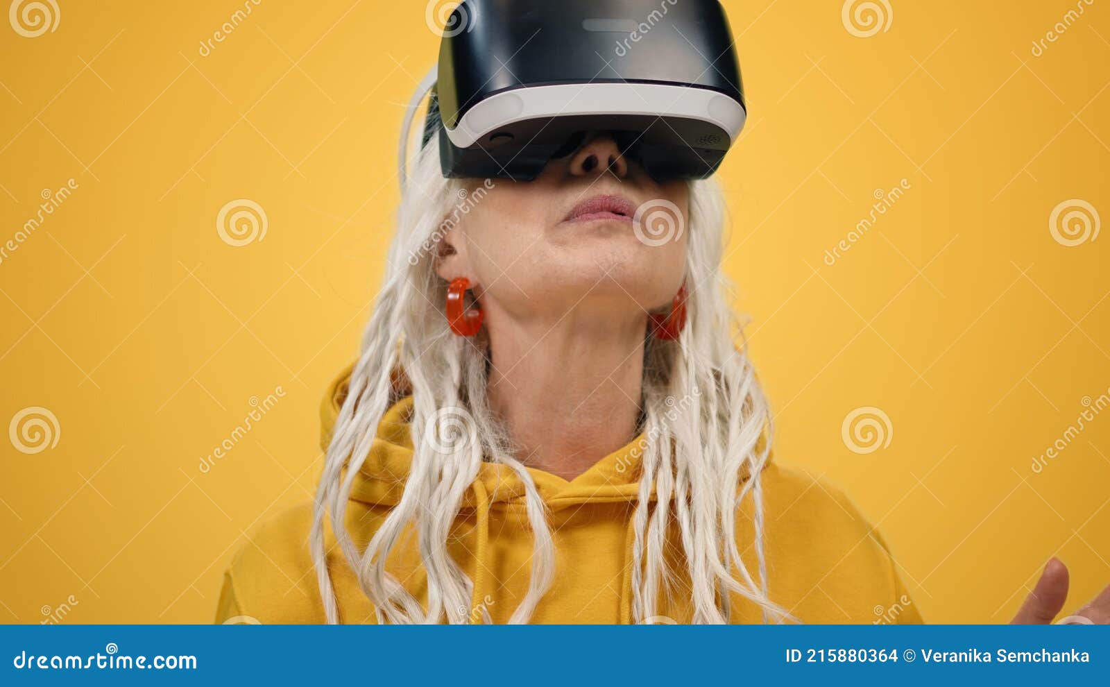 Surprised Senior Woman Watching Film in Vr Glasses. Old Lady Playing Indoors. Stock Image of playing, aged: 215880364