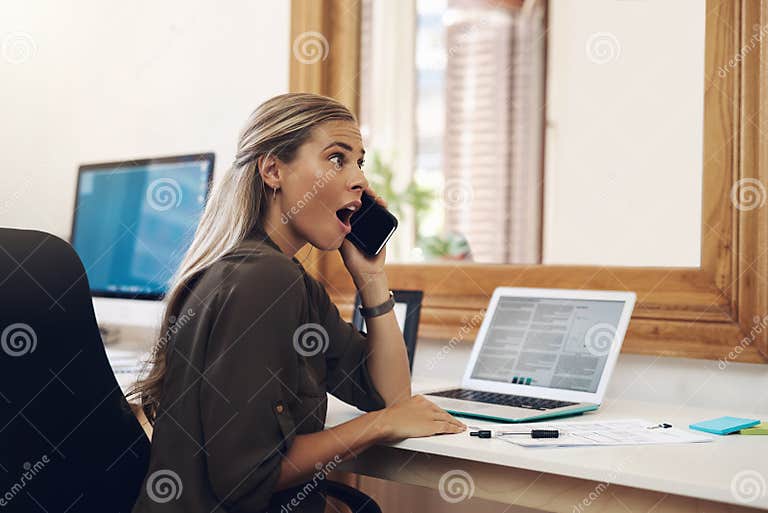 Surprised Shocked And Excited Young Businesswoman Gossiping And Listening To Fake News On A