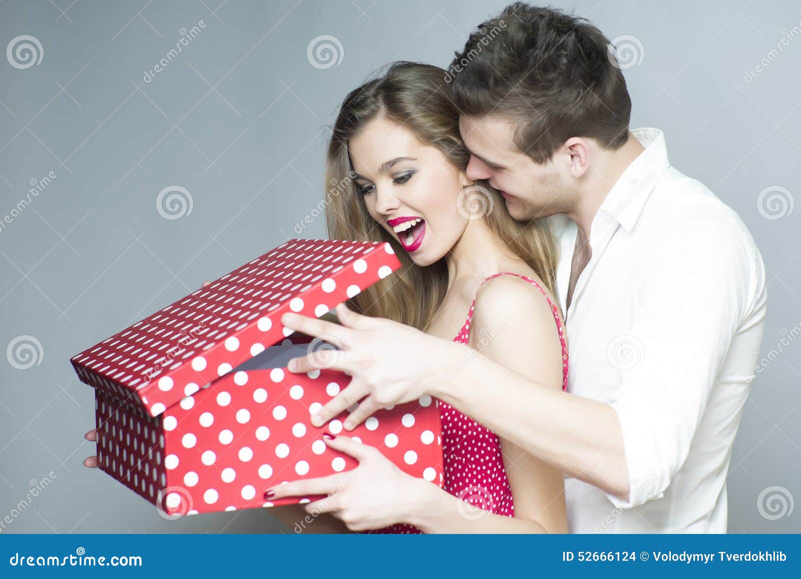 Surprised smiling couple stock photo. Image of holding - 52666124