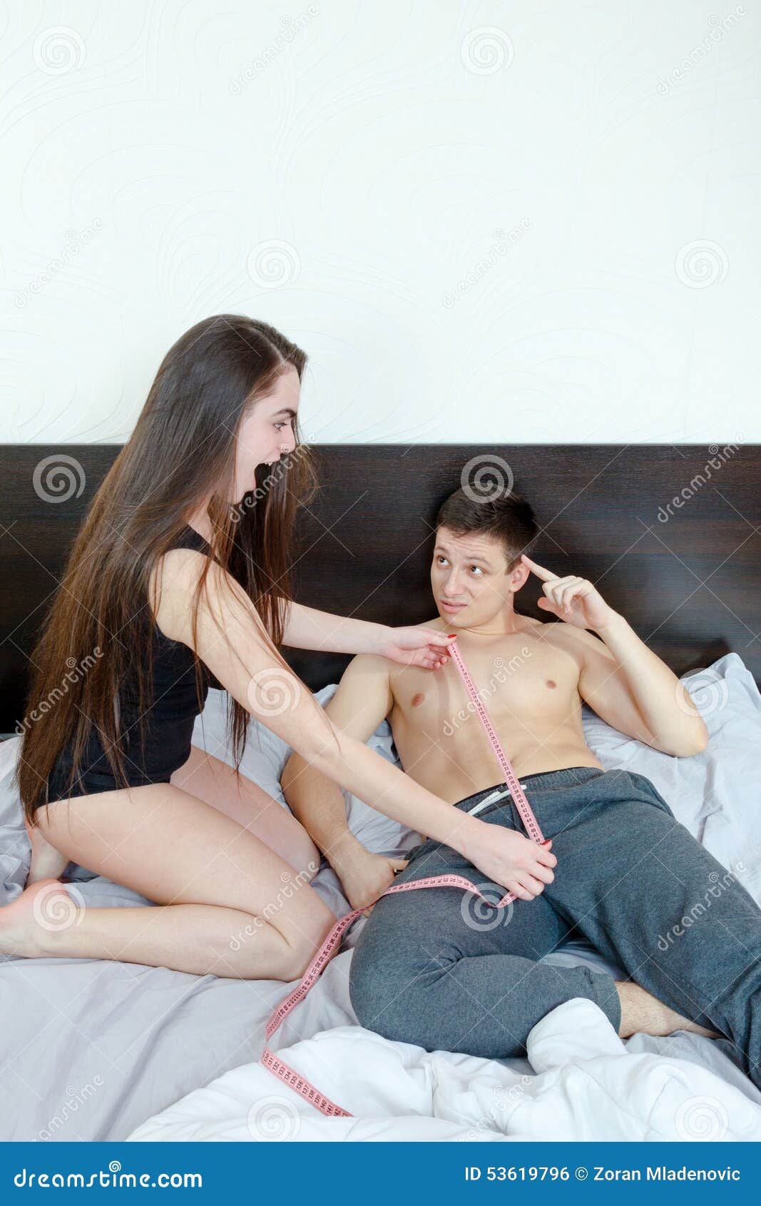 Surprised Woman Measuring Man S Penis Length Stock Photo