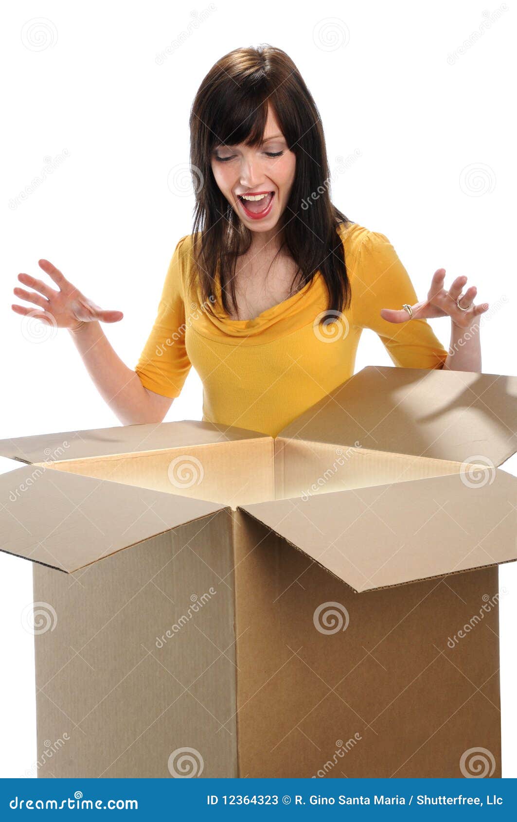 A Smiling Young Woman Opening Cardboard Box With A Box Cutter At Home  Delivered Gift By Air Mail Stock Photo, Picture and Royalty Free Image.  Image 101537170.