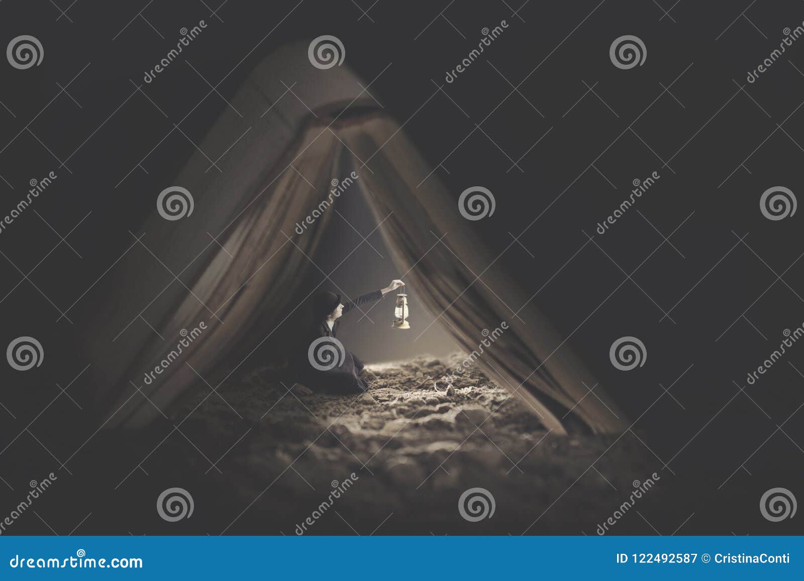 surreal image of a tiny woman who uses a book as a shelter for the night