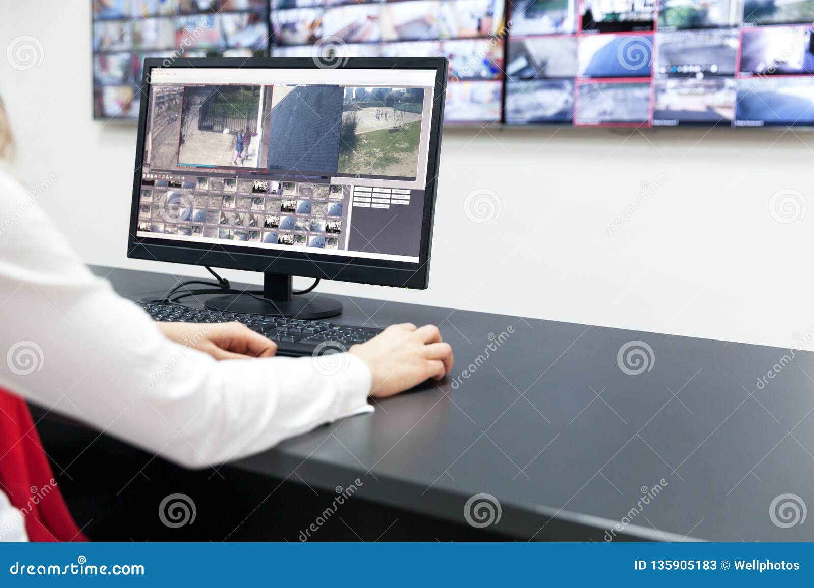 Surveillance Control Room Operator At Work Editorial Stock Photo surveillance-control-room-operator-at-work-editorial-stock-photo