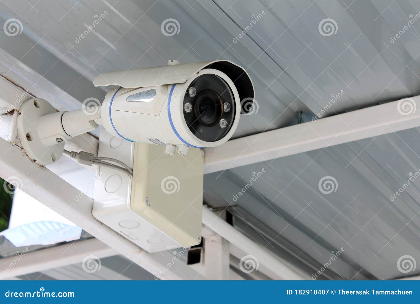 Surveillance Security CCTV Camera on the Roof at Night, Safety or