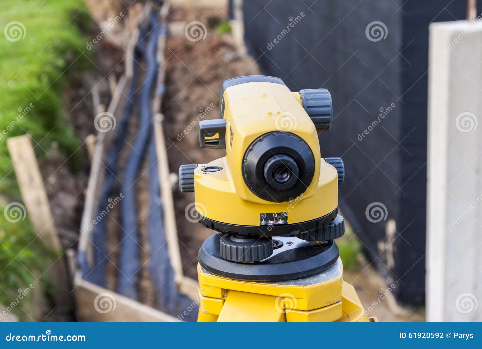 Surveyor Equipment Optical Level At Construction Site. Stock Photo
