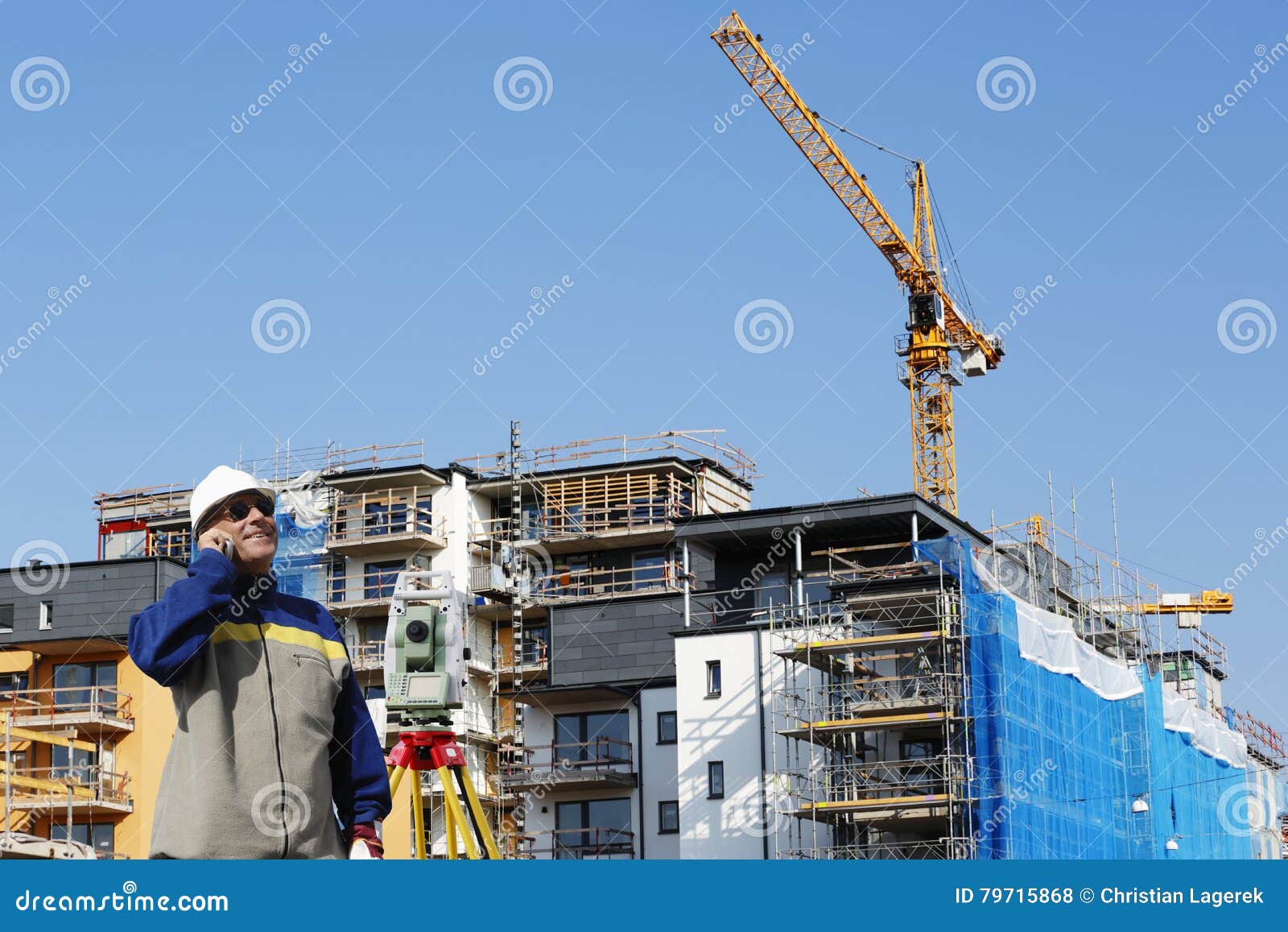 Surveyor with Measuring Instrument and Construction Stock Photo Image