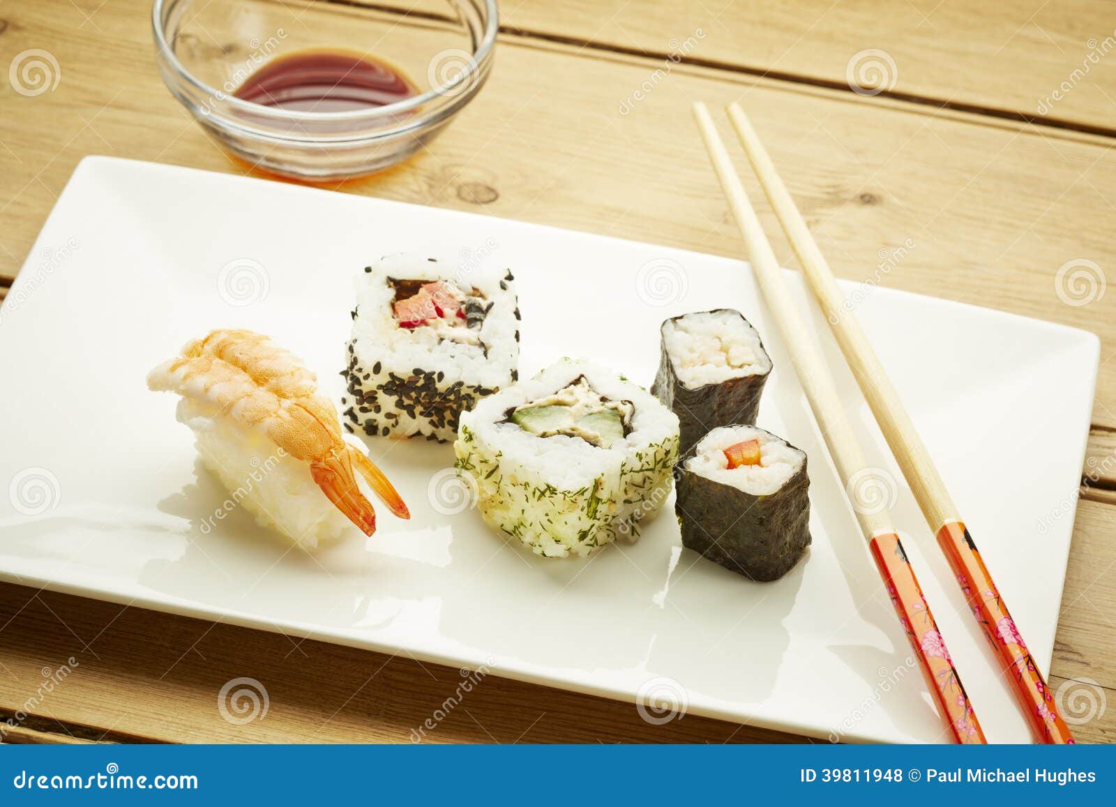 Sushi with chopsticks stock photo. Image of dish, eating 39811948