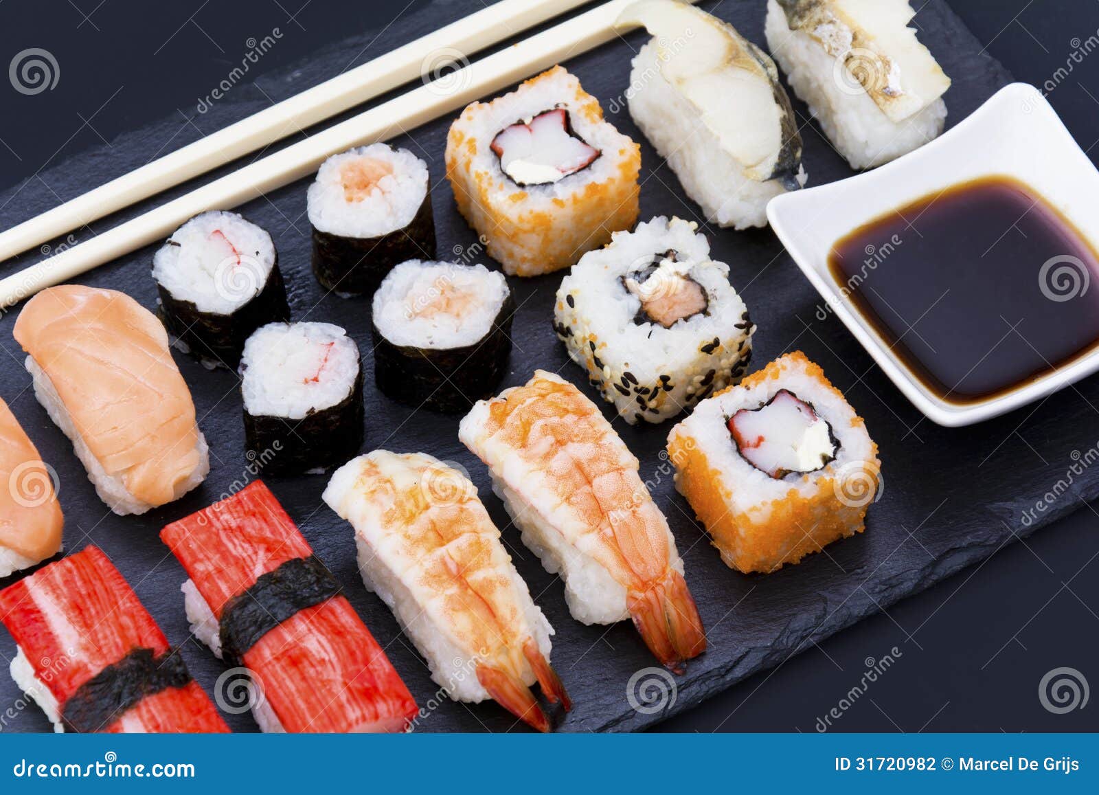 Sushi with chopsticks stock photo. Image of healthy, dinner 31720982