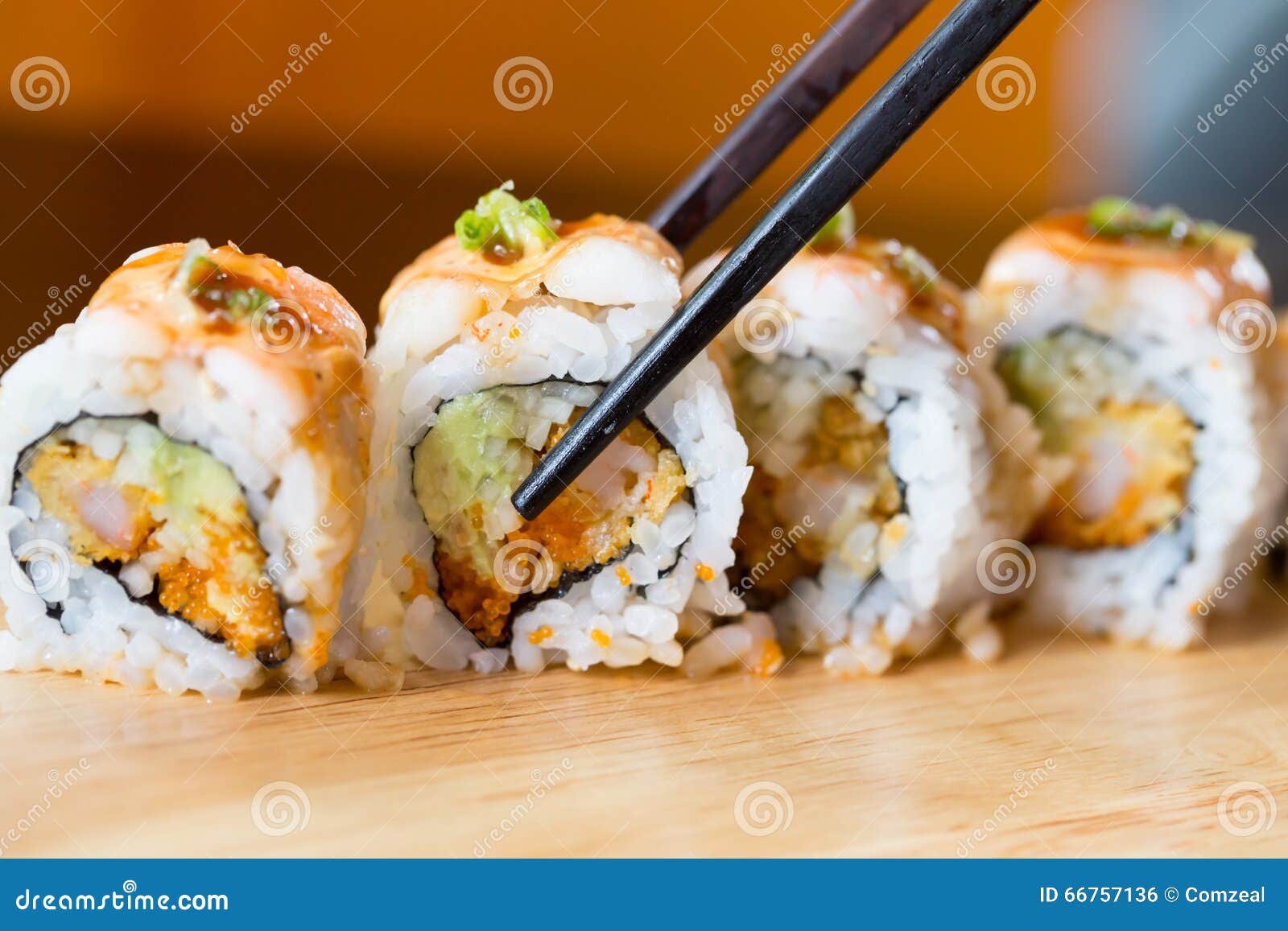 Sushi with chopsticks stock photo. Image of japanese 66757136