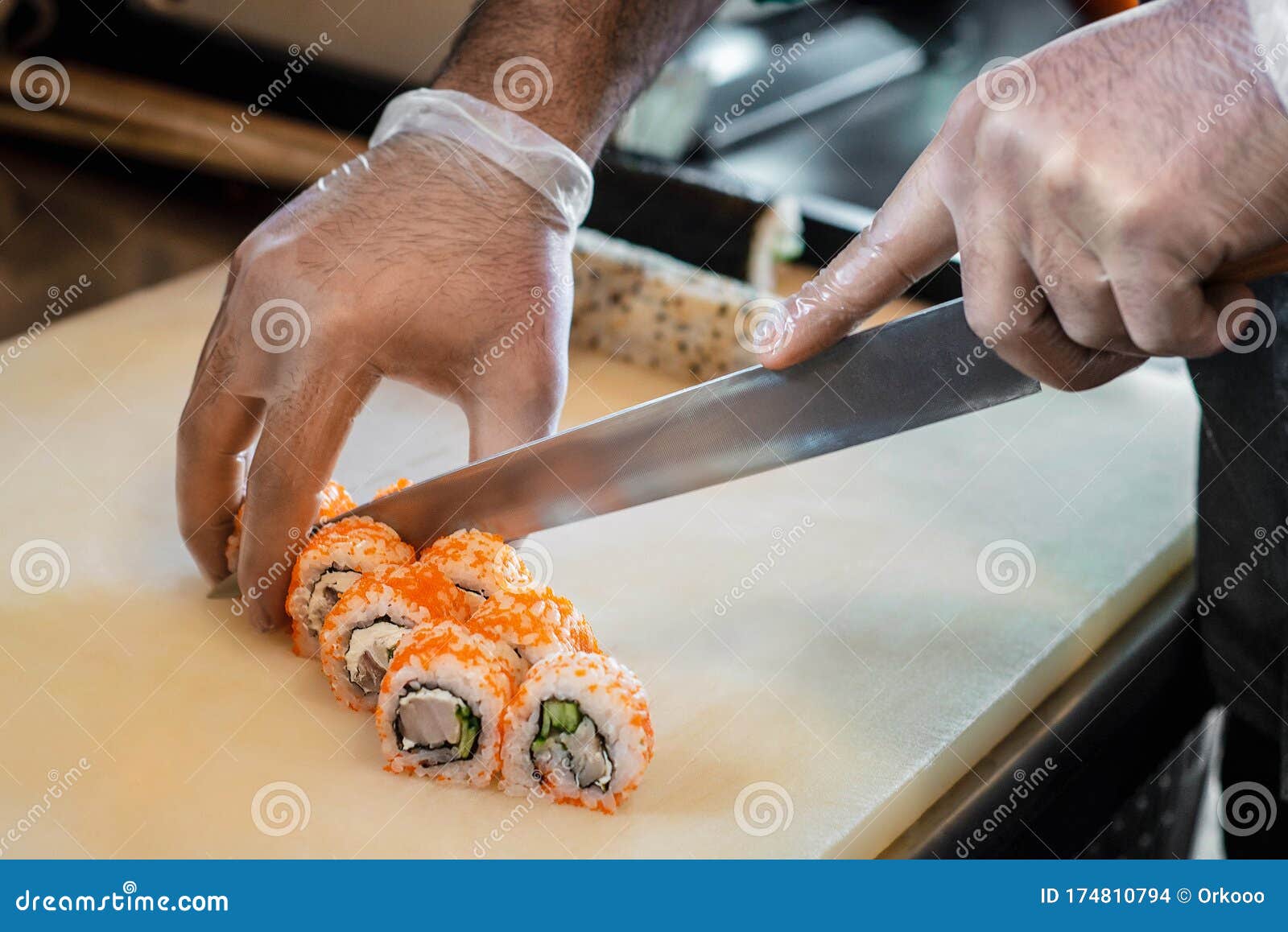 Sushi Kitchen Sushu Being Made And Cut Stock Photo Image Of Closeup Knife 174810794