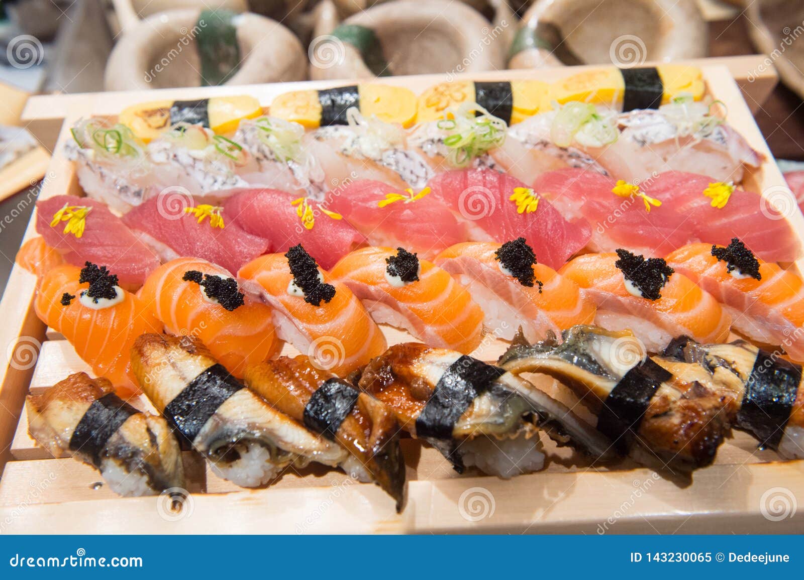 Sushi on a Plate in a Japanese Restaurant Stock Image Image of salmon, sashimi 143230065