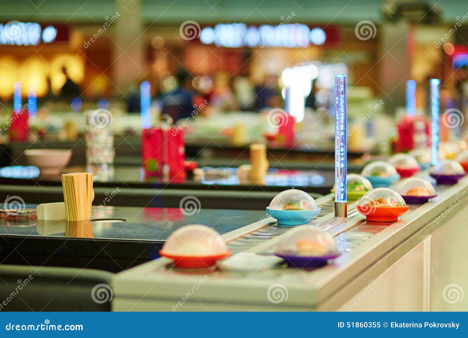 Sushi Plates on Rails in Restaurant Stock Image Image of crockery
