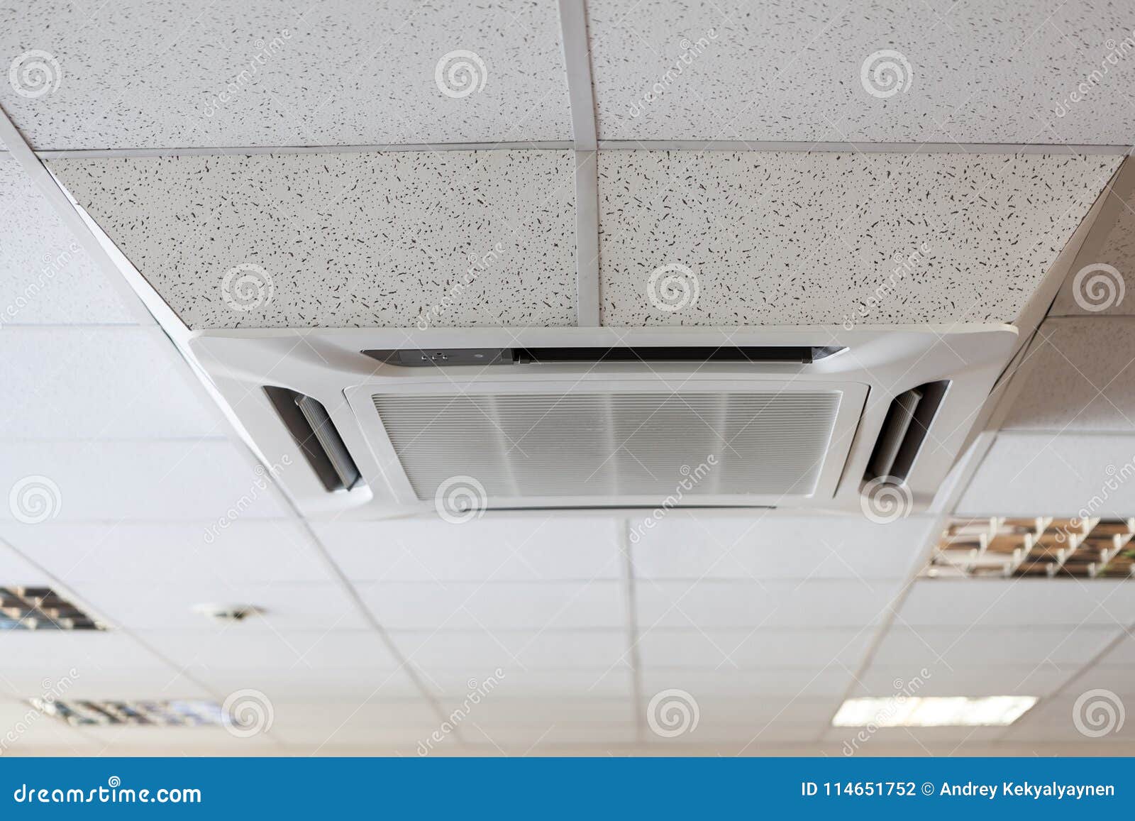 suspended tile ceiling with big air-conditioner unit, office room