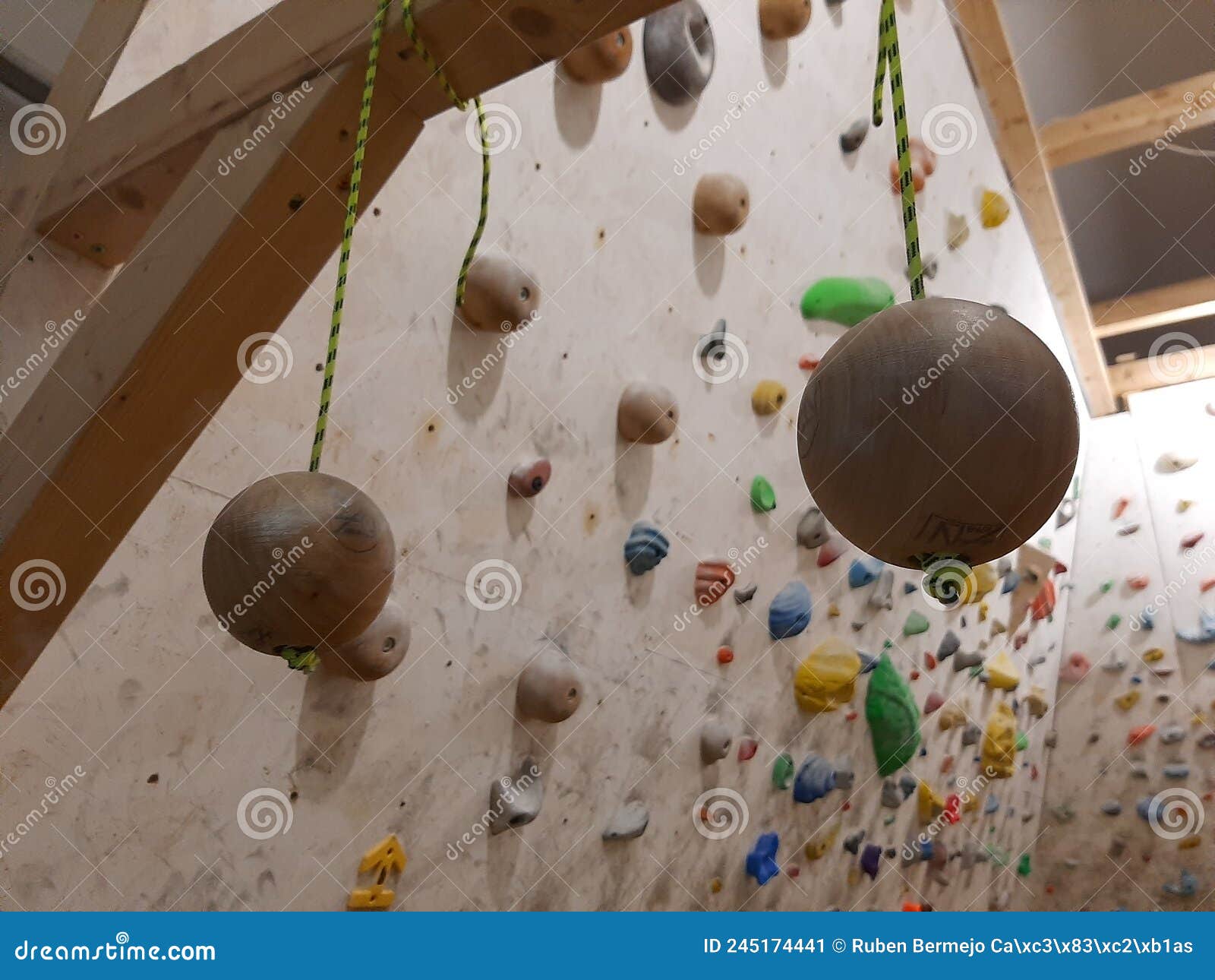 suspension balls for climbing training hang on a climbing wall