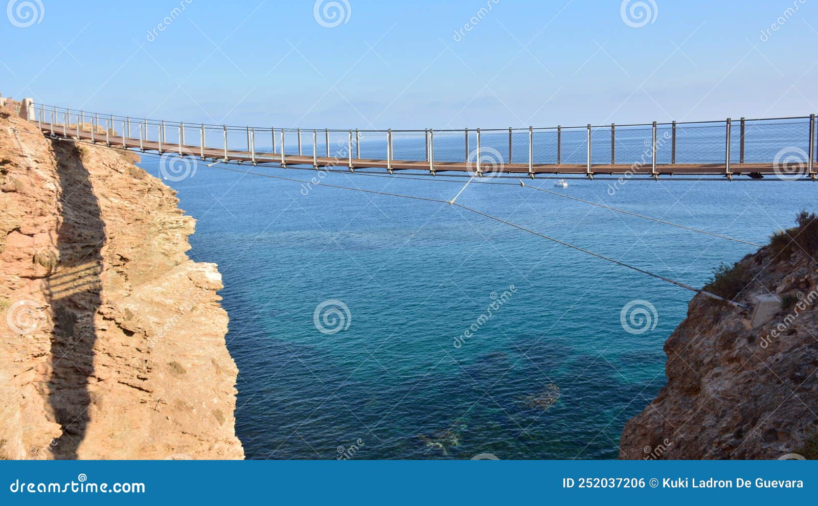 suspension bridge in torrenueva beach, granada