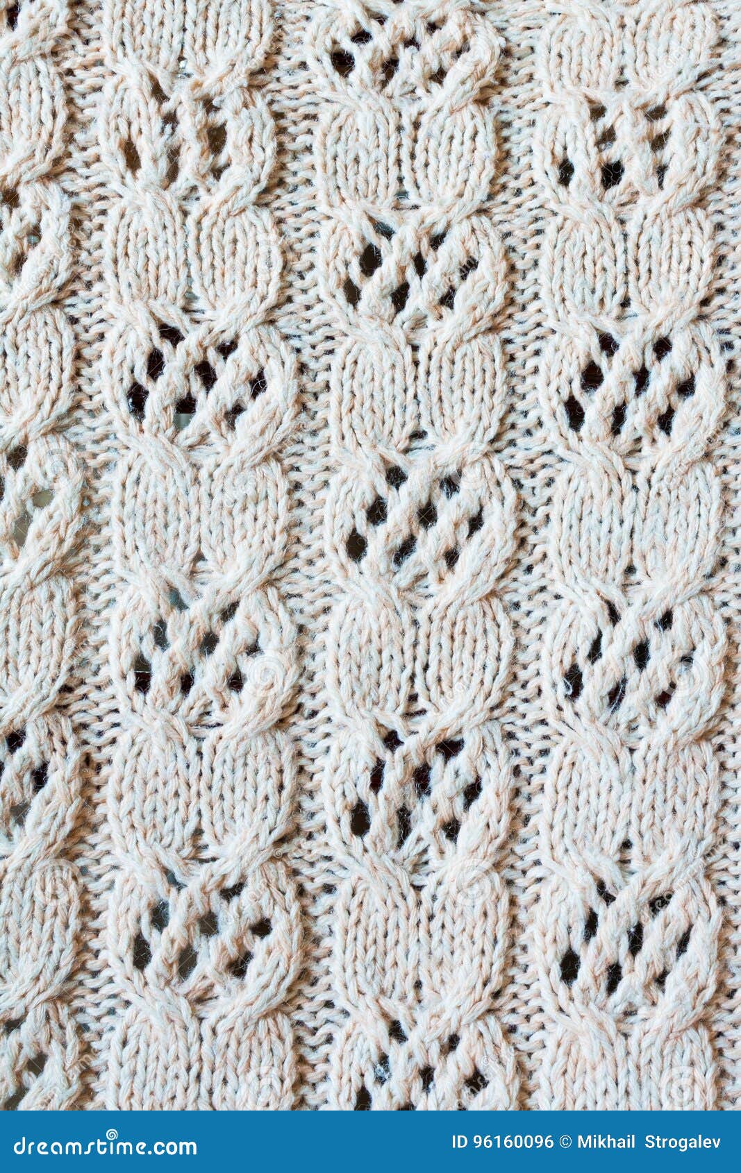 Knitted From The Wool With An Openwork Pattern Background
