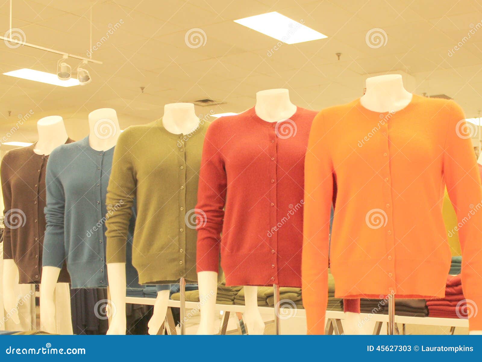 Sweaters in a Store stock image. Image of clothes, blue 45627303