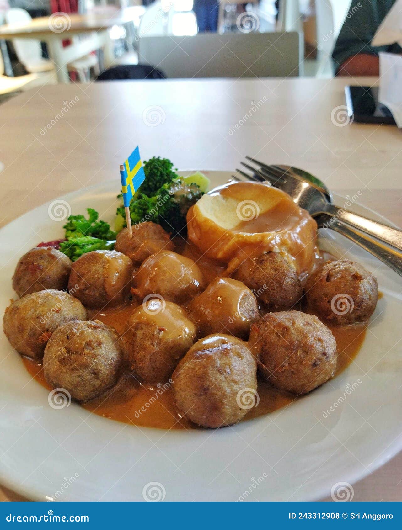 Swedish Meatballs and Brown Sauce with Mashed Potato and Broccoli on a