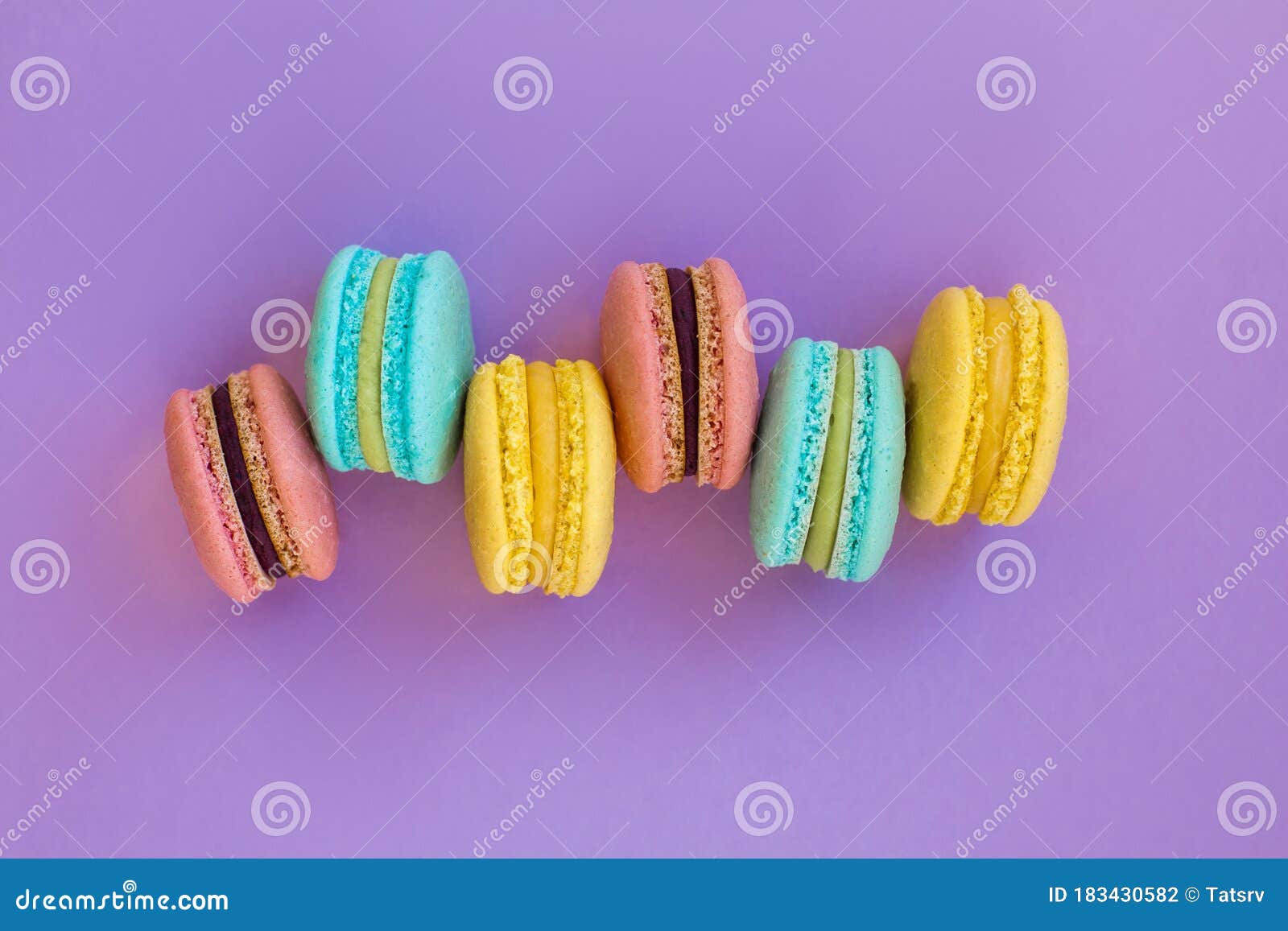 Sweet Colorful French Macaroon Biscuits on Violet Purple Background ...