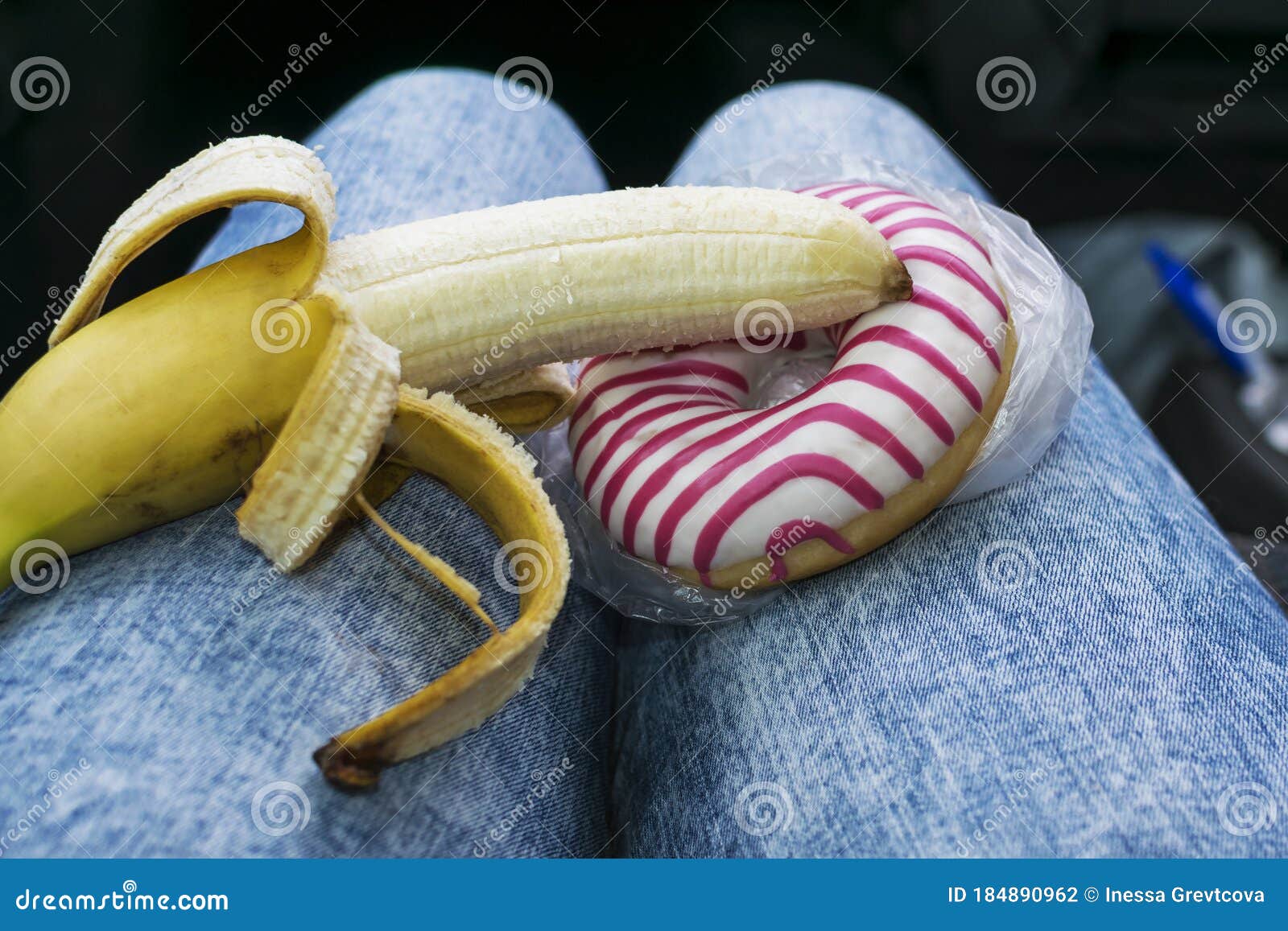 Sweet Doughnut And Peeled Banana Concept Of Sex And Eroticism Stock