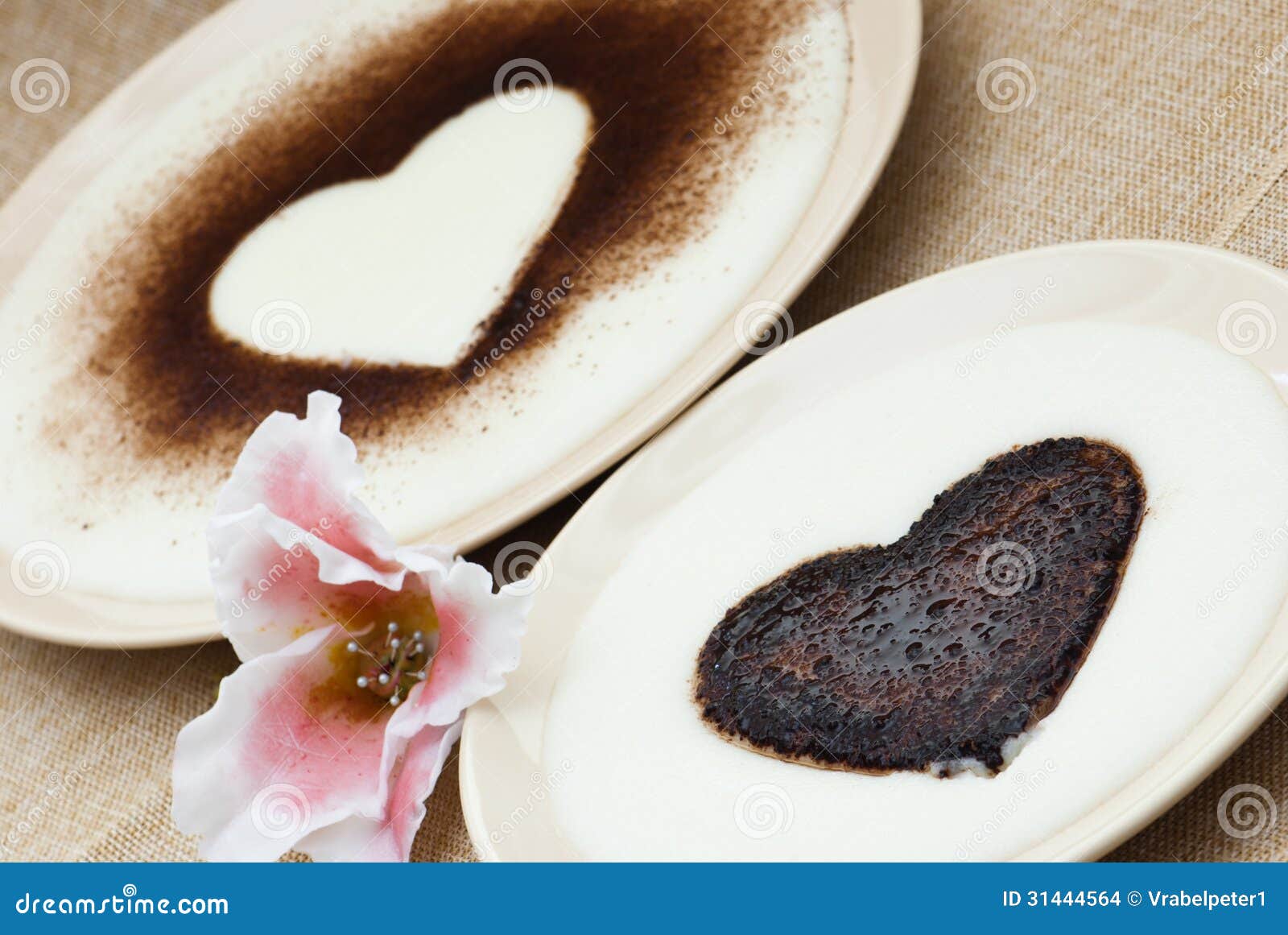 Sweet Hearts in Semolina Pudding with Flower of Sugar Stock Photo