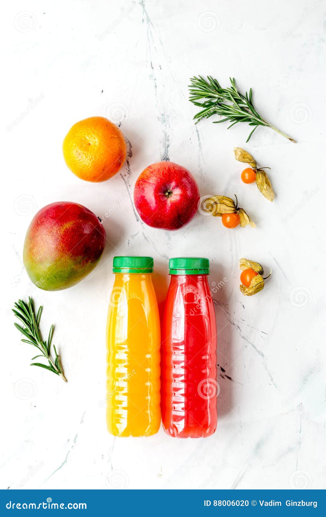 Sweet Juice in Bottle with Fruit on White Background Top View Mockup