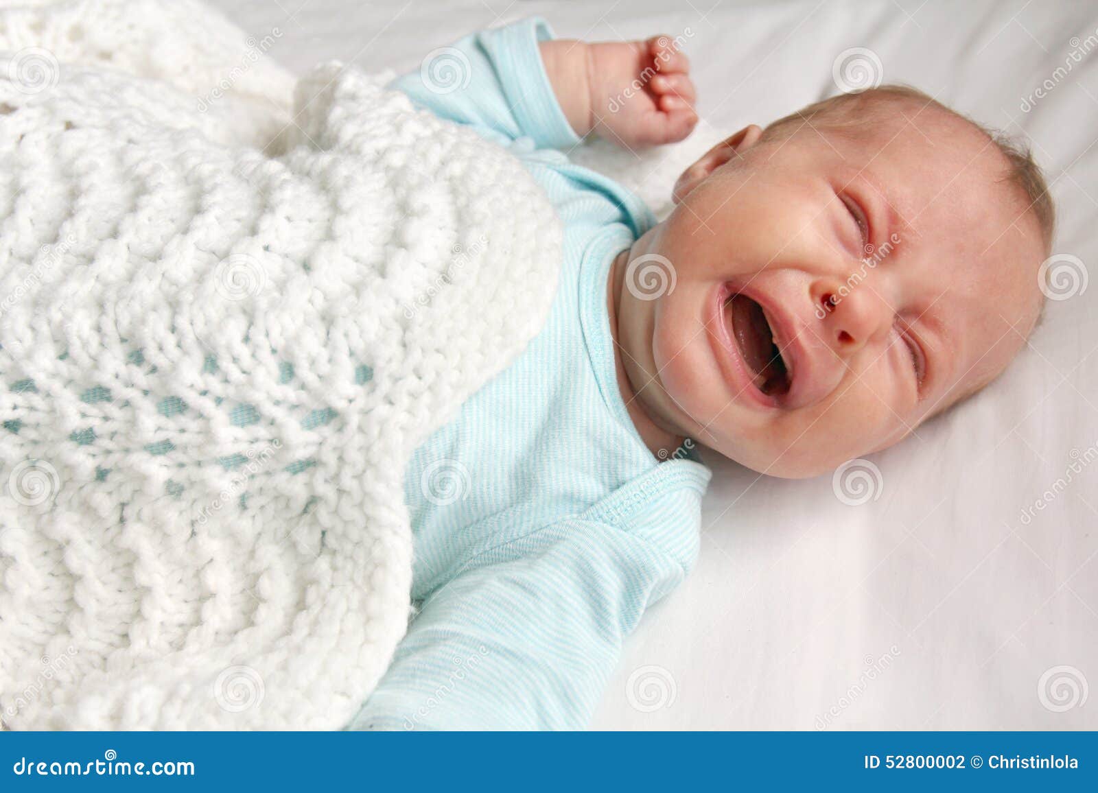 Sweet Newborn Baby Crying in Crib Stock Photo - Image of baby, crib