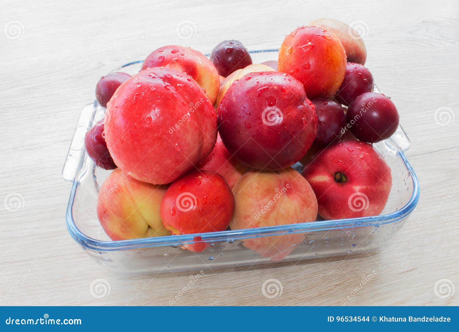 Sweet Peaches, Nectarine and Plums. Ripe Fruit on the Table Stock Photo