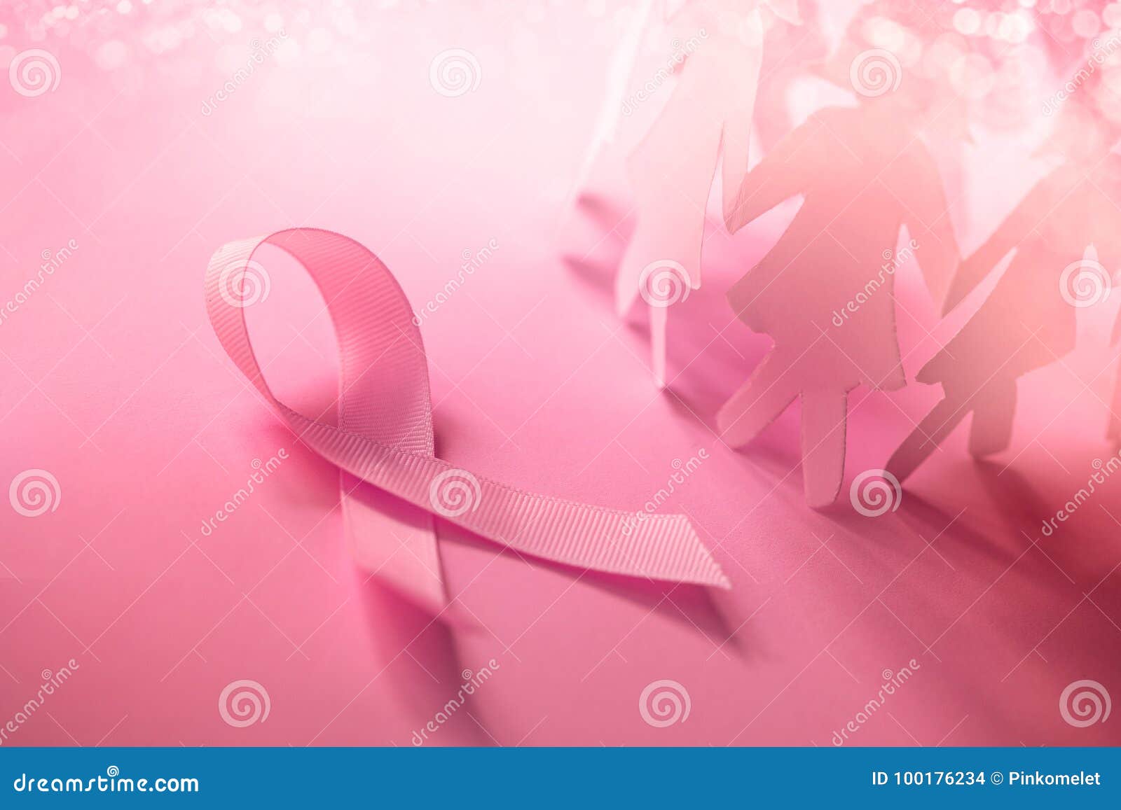 the sweet pink ribbon  with girl paper doll on pink background for breast cancer awareness  to promote in october mo