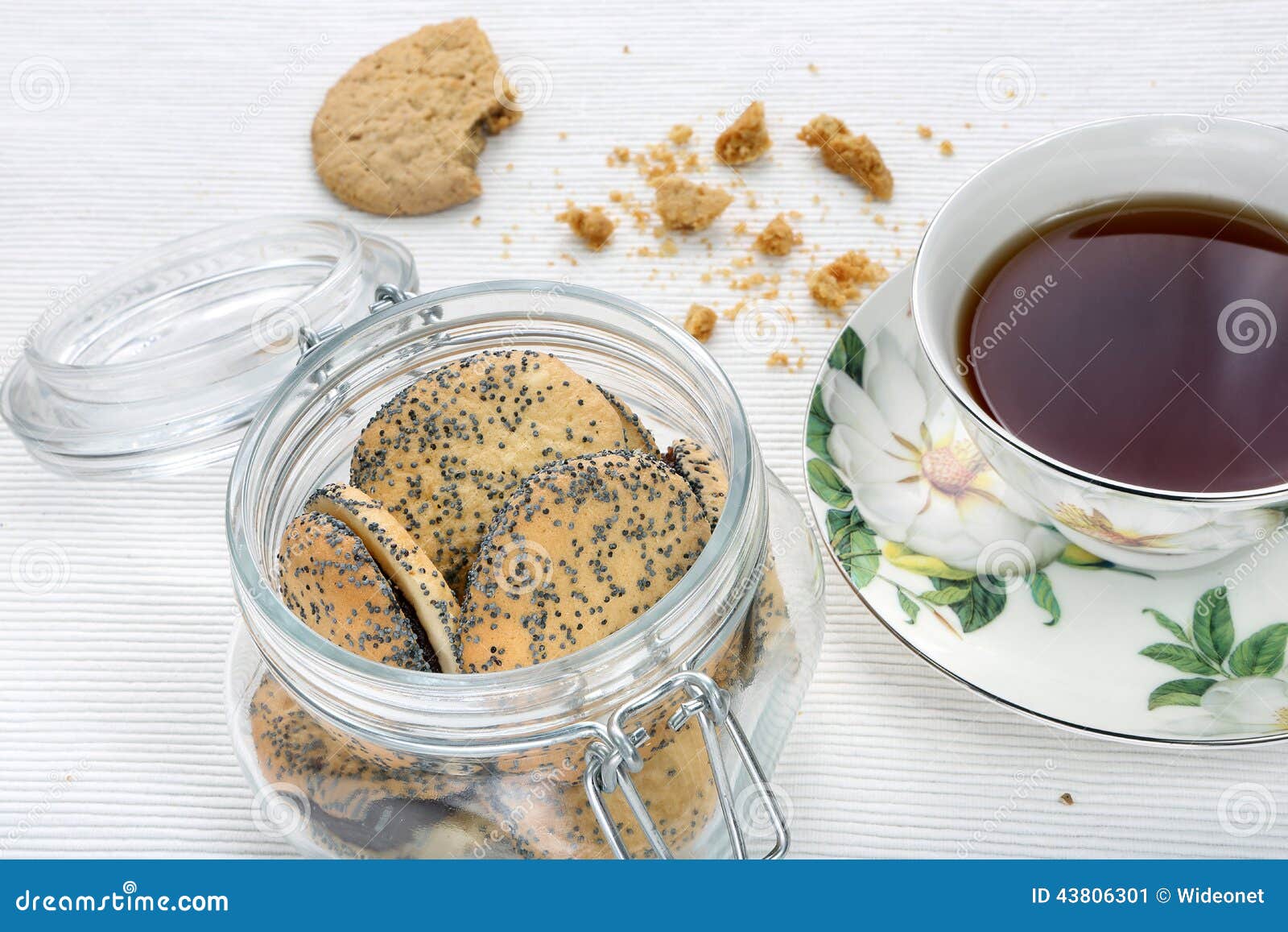Sweet Poppy Seed Shortbread Biscuits with Jam in a Jar Stock Image
