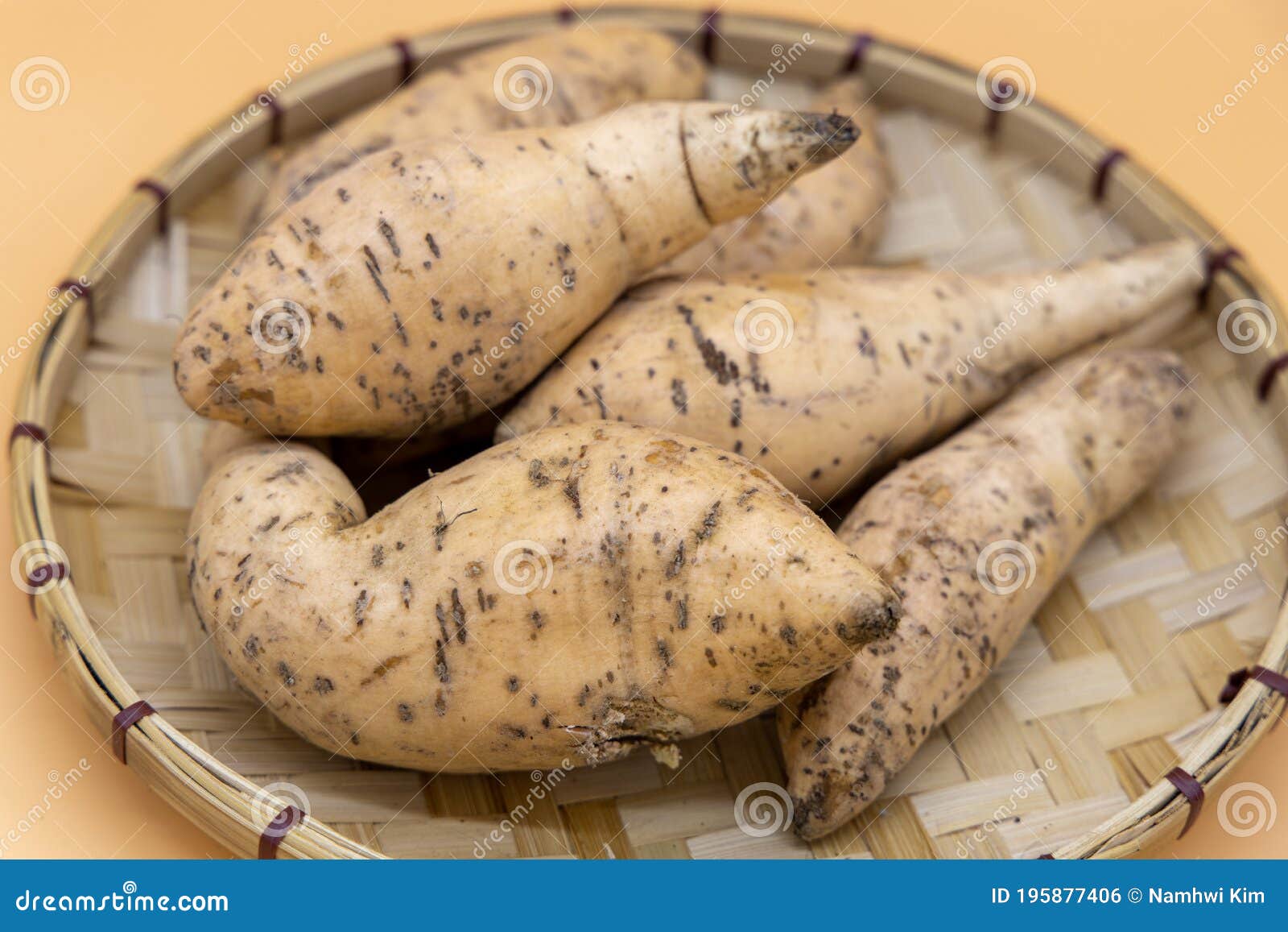 Sweet potatoes in a basket stock photo. Image of snack 195877406