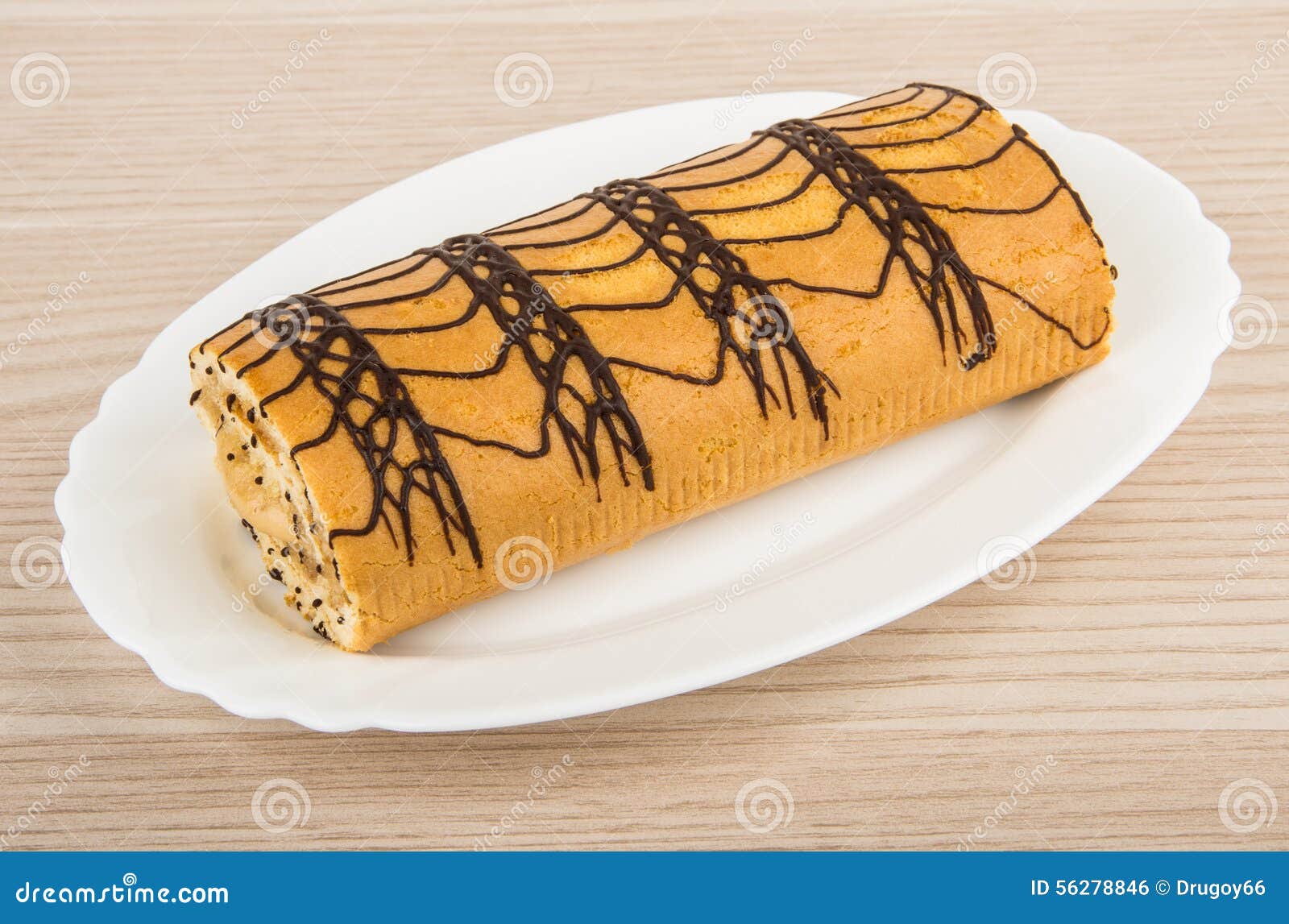 Sweet Roll Cake in Glass Dish on Table Stock Photo Image of wooden