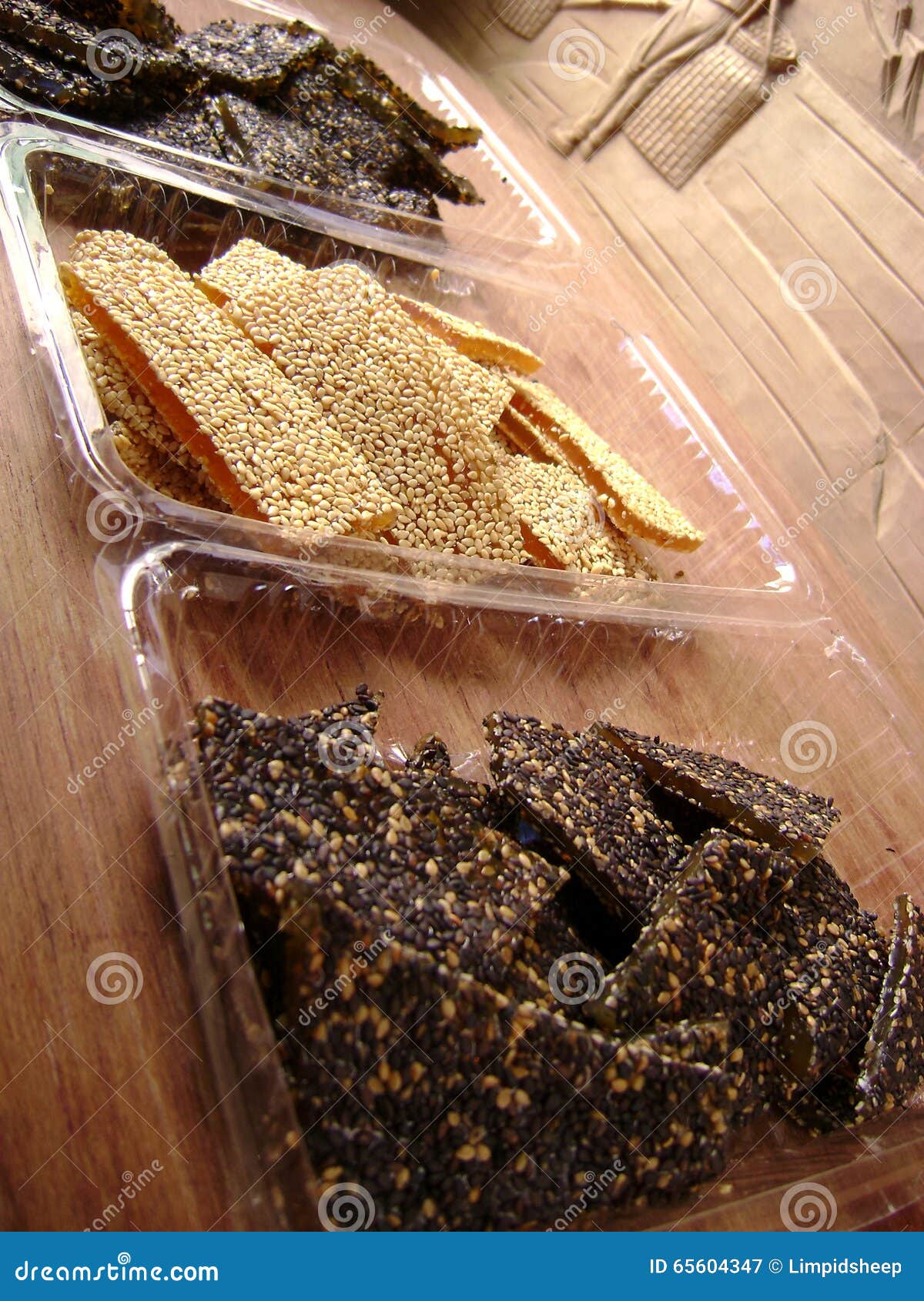 Sweet sesame brittle stock image. Image of yellow, sesame 65604347
