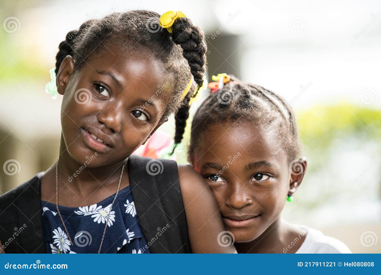 Jamaican School Girls Wide Brown Eyes Shy Little Sister Leaning On Shoulder Of Older Sister 