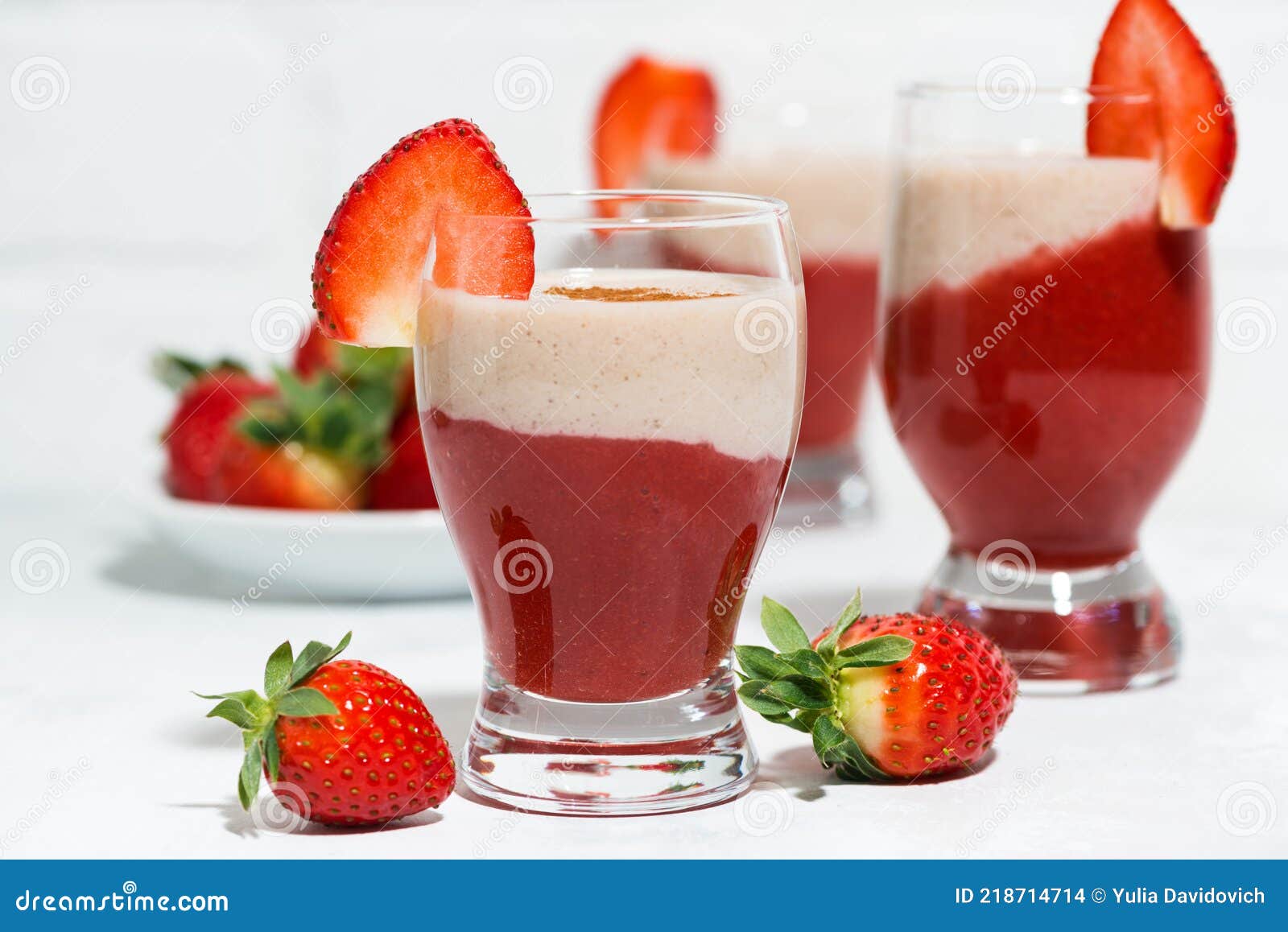 close up shot of strawberry milkshake with whipped cream In a