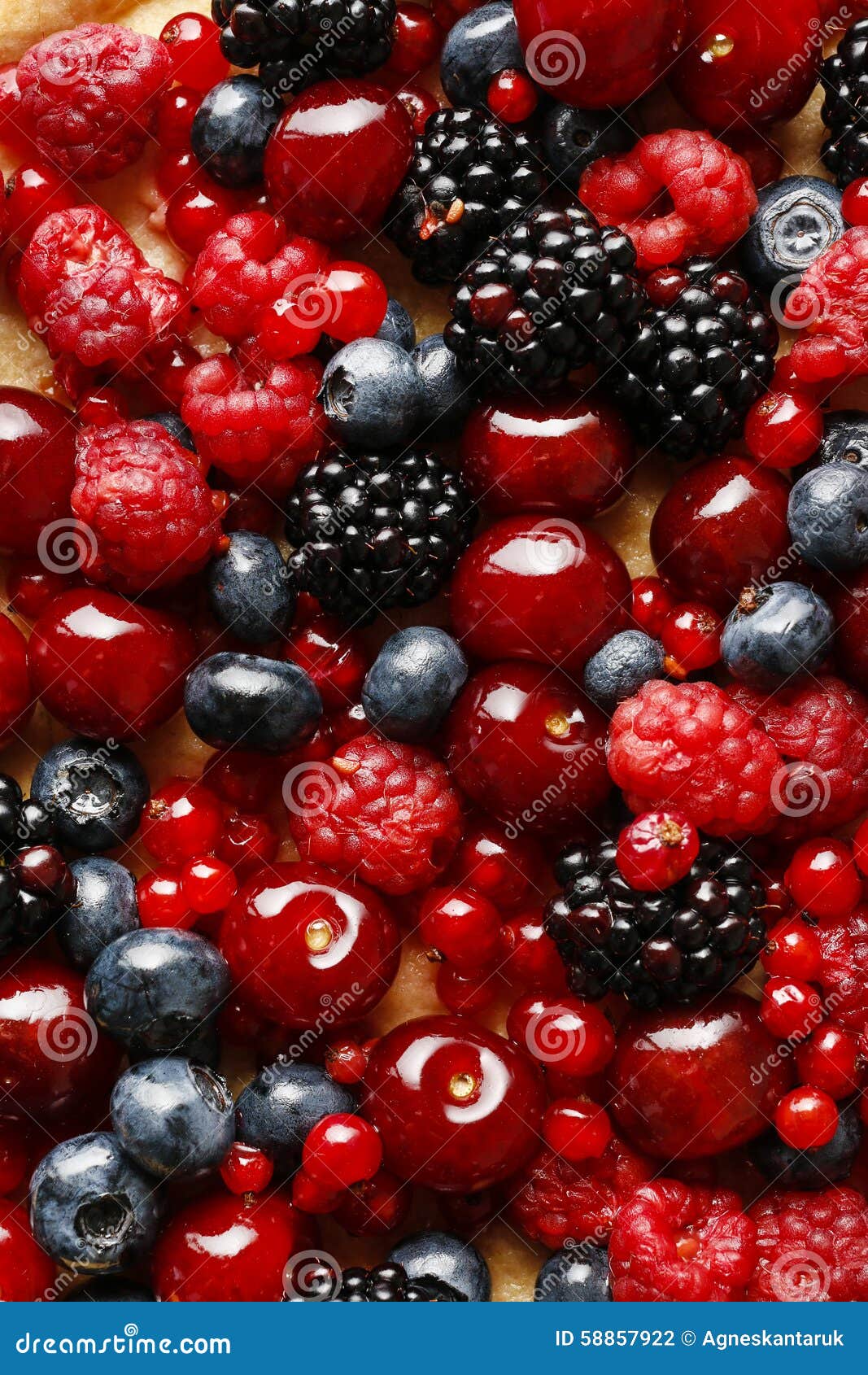 sweet tart with raspberries, blueberries, blackberries, cherries