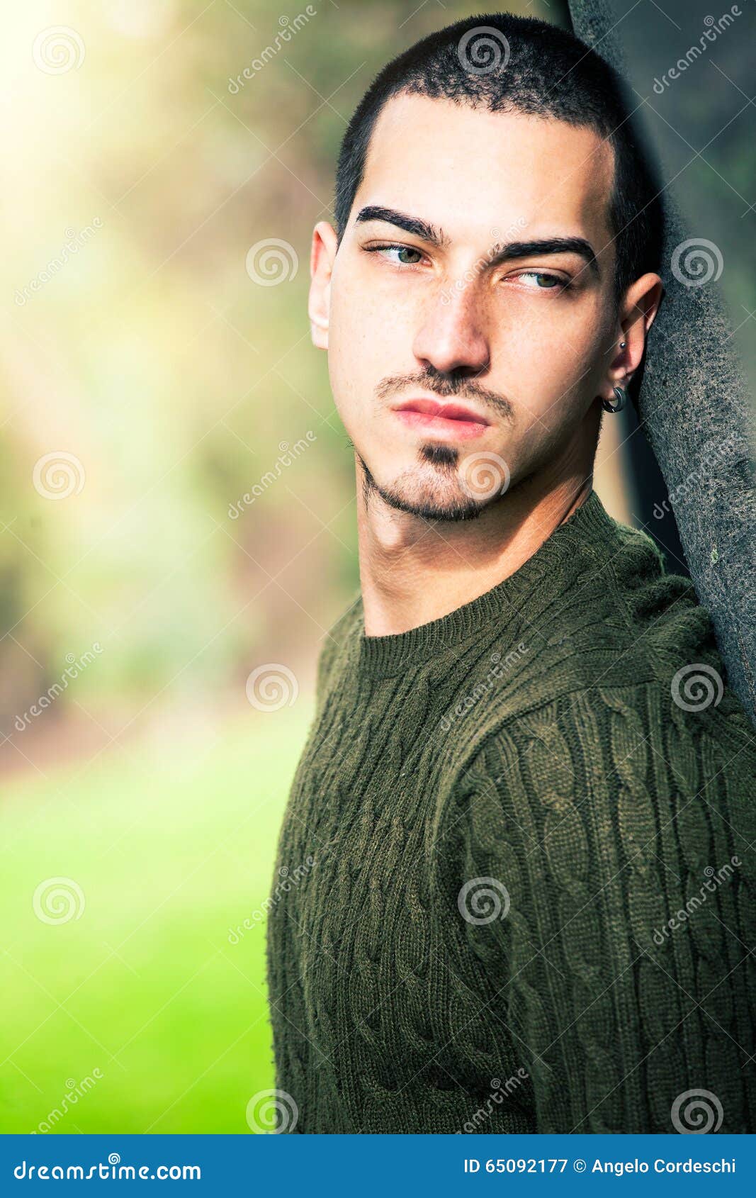 Sweet Young Man Outdoors. Natural Harmony Expression. Thinking Stock ...
